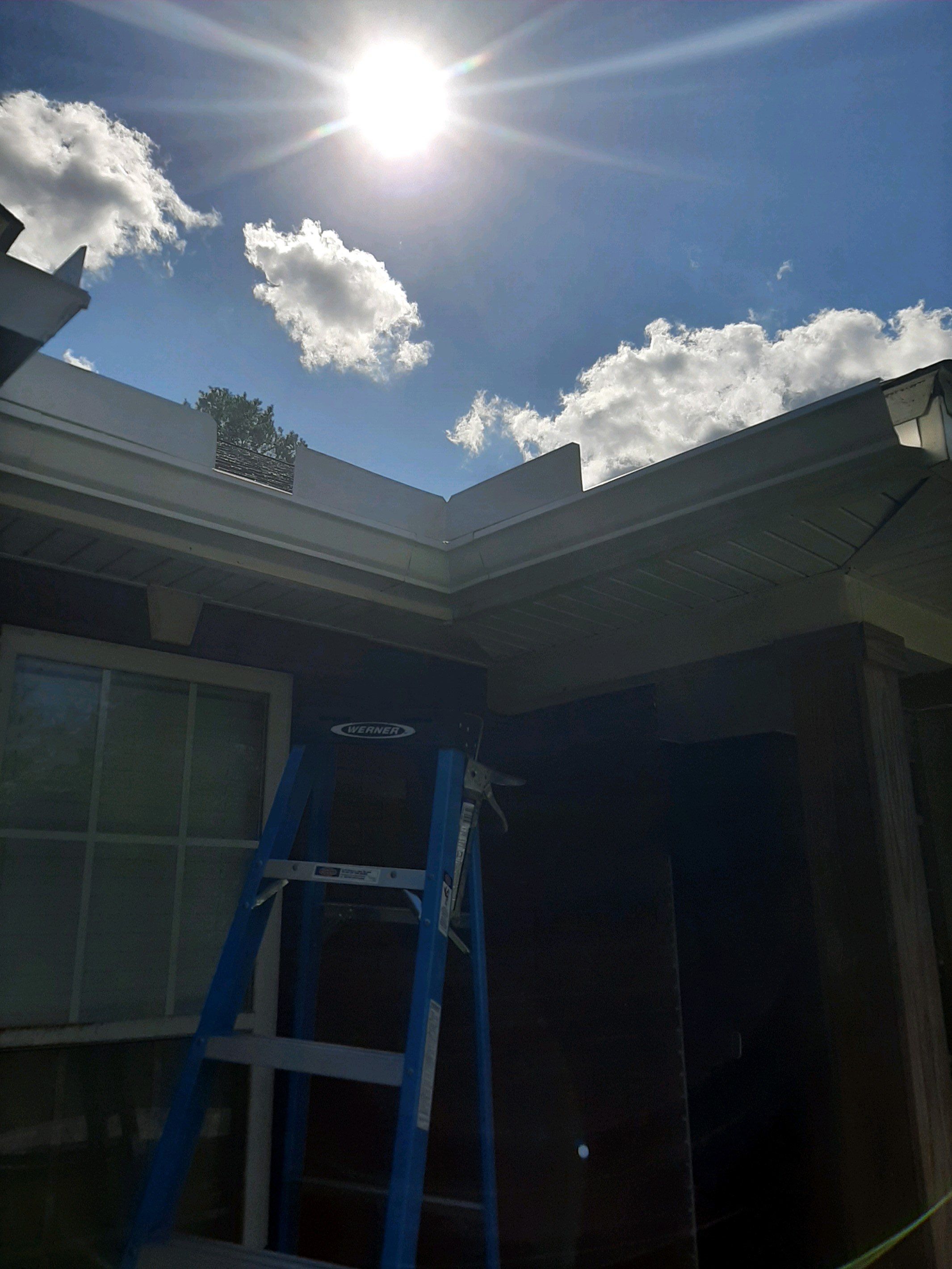 Gutter Installation using White K-Style Seamless Gutters by Gutter Professors