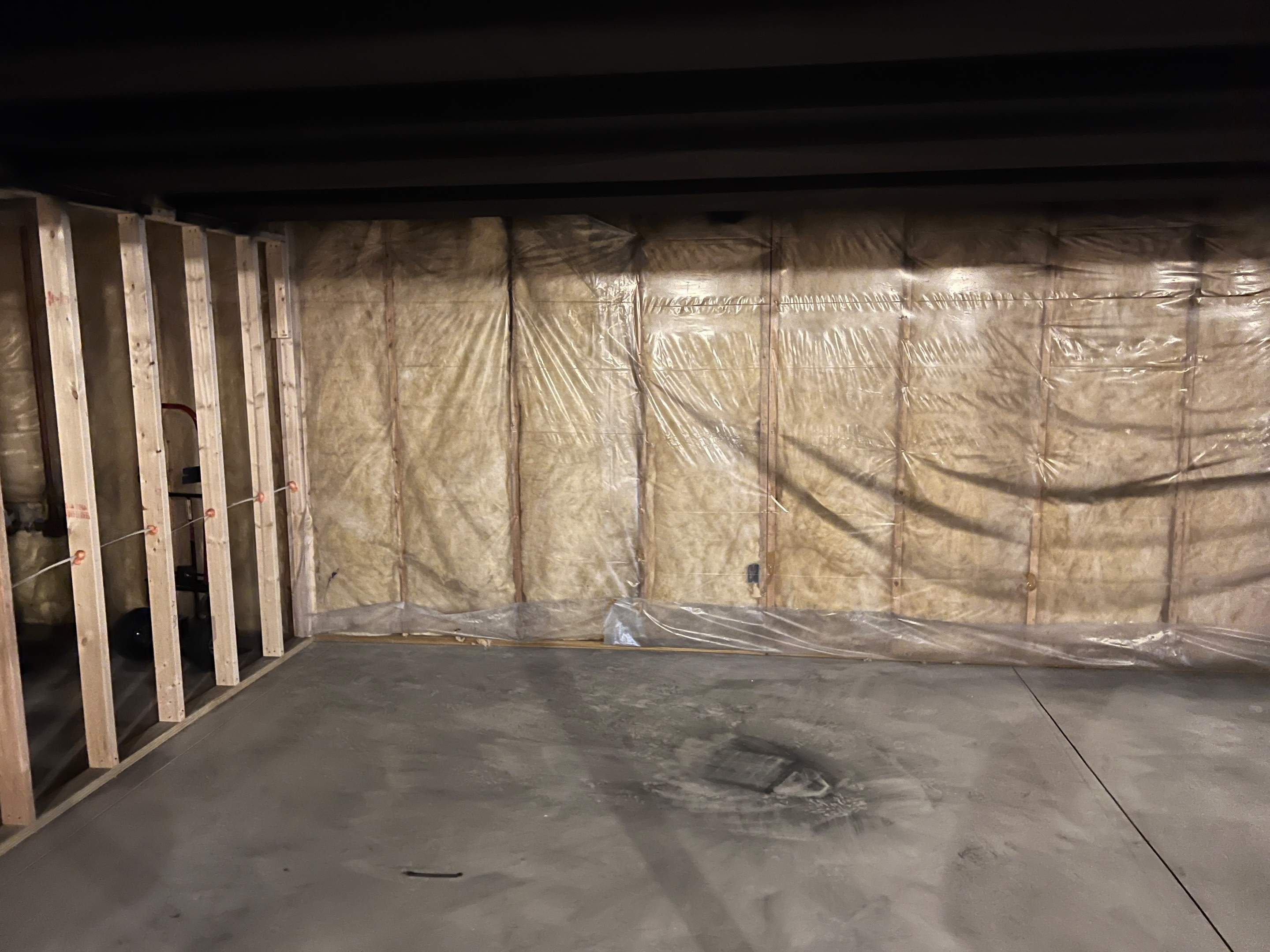 Basement Remodel w/ LVP Flooring & Exposed Ceiling by Chagnon Building & Remodeling LLC