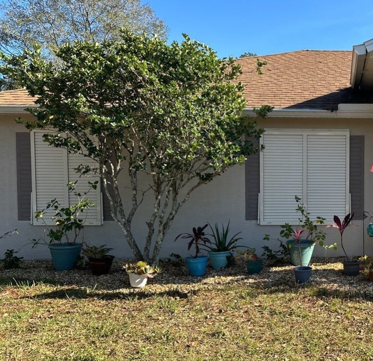 Hurricane Rated Bahama Shutters in Cream by Smart Guard Shutters