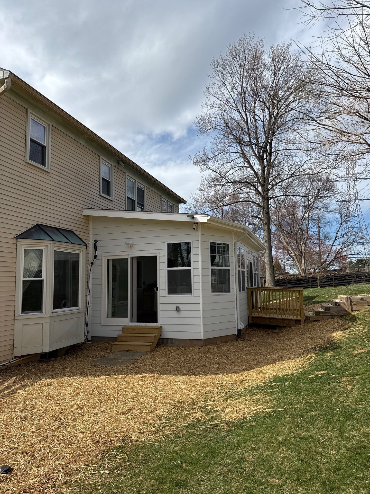 Sun room  using Concrete wood lumber, insulation , drywall, painting , cabinets , laminate floor  . by Jesus Master Handyman LLC 