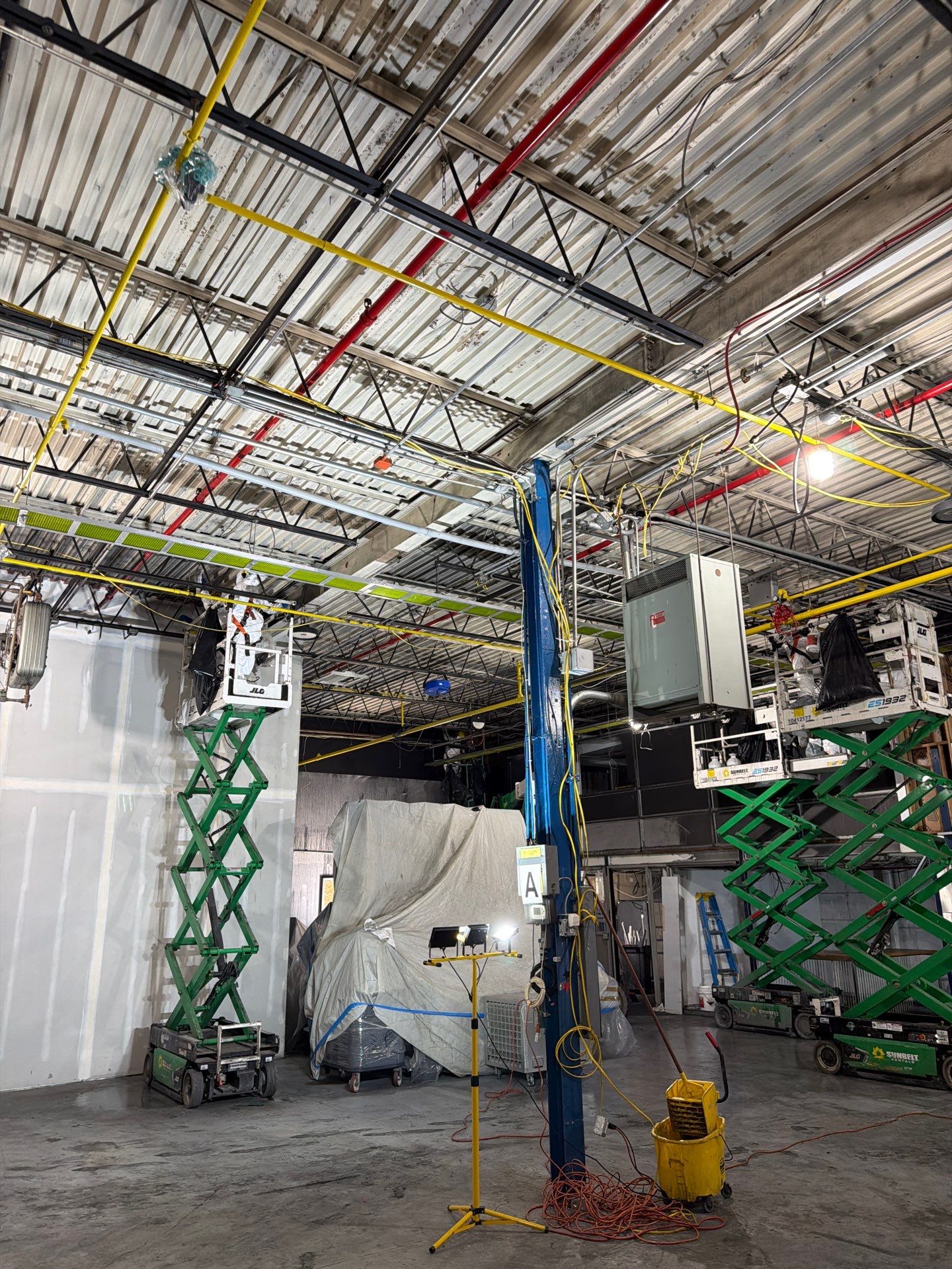 Industrial Warehouse Fire Damage Cleaning and Spray Sealing in Islandia by EMS Restoration Corp