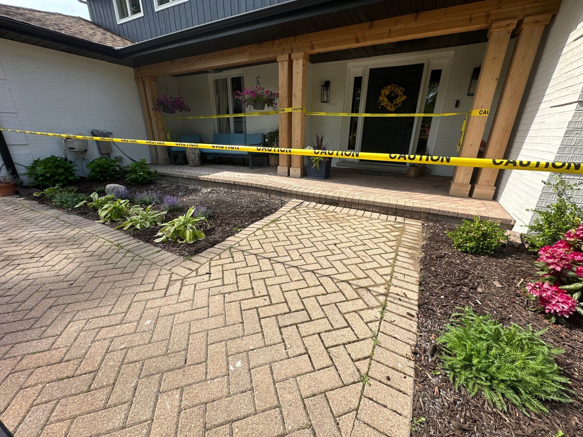Brick paver repair, cleaning and sealing by Northern Power Washing LLC.