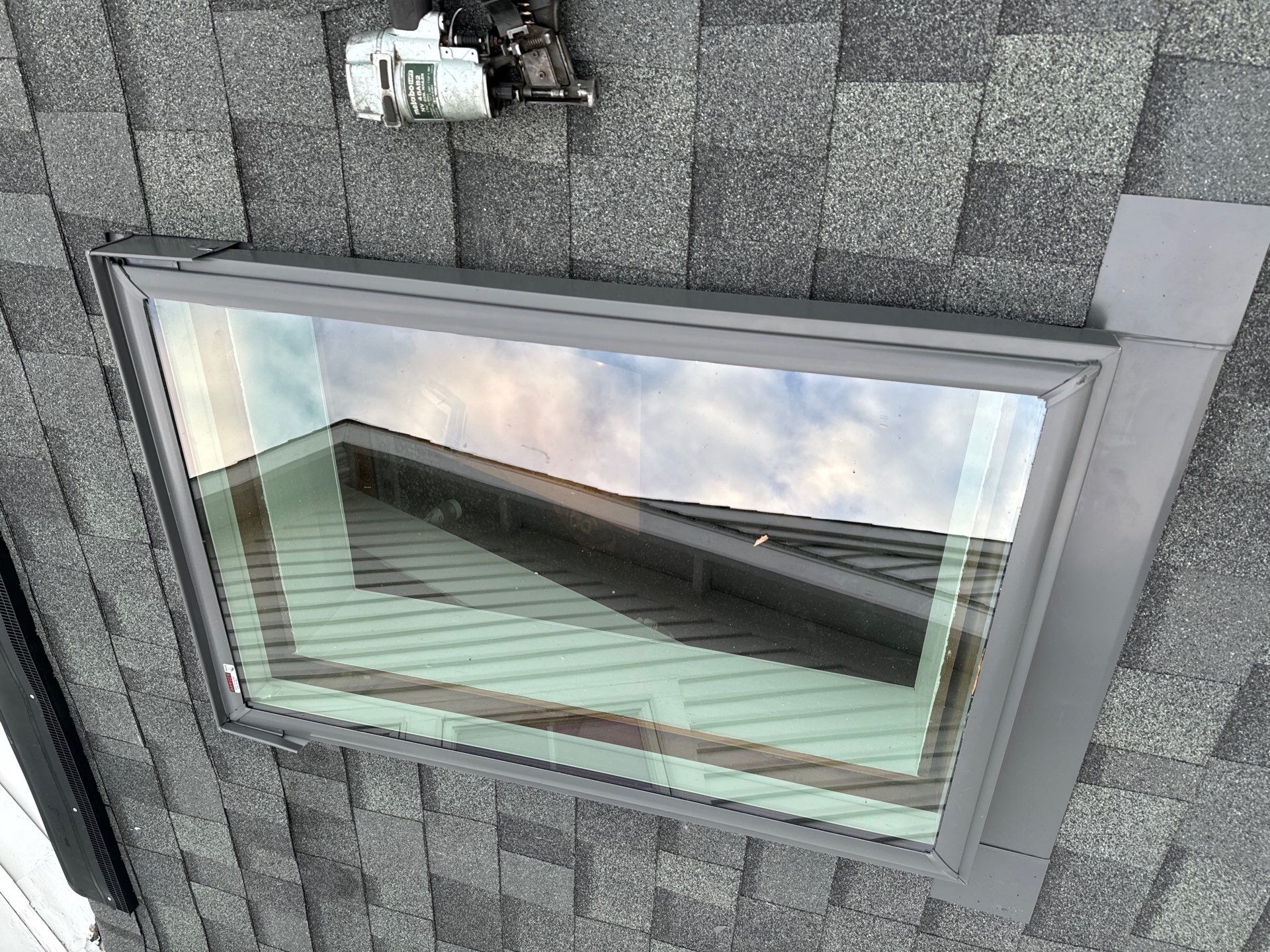 Six Squares of Owens Corning Shingles, and a Velux Skylight in New Castle, NH by Tall pine roofing