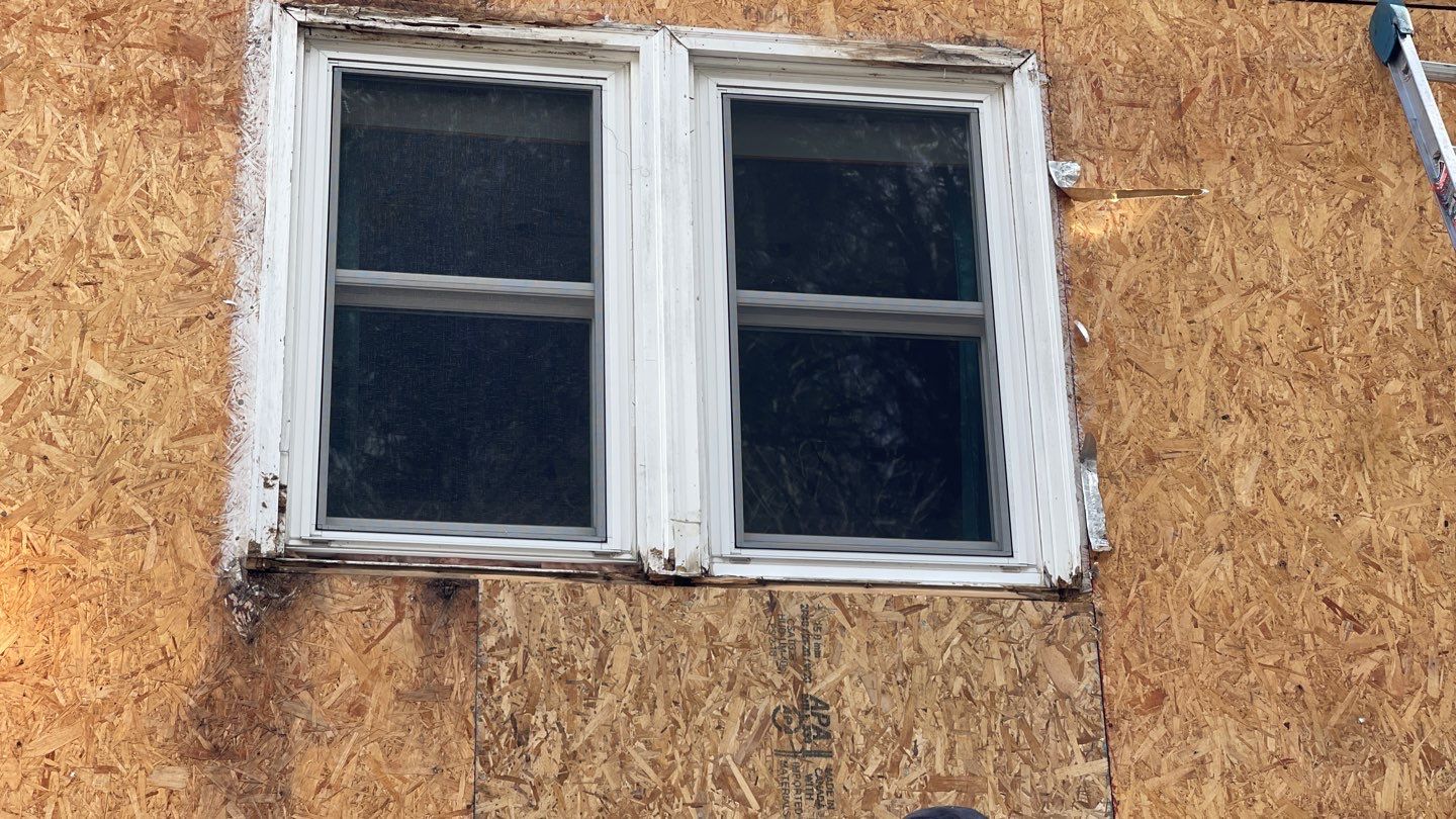 Complete Exterior Renovation with New Siding & Gutters   by Sensible Home Solutions