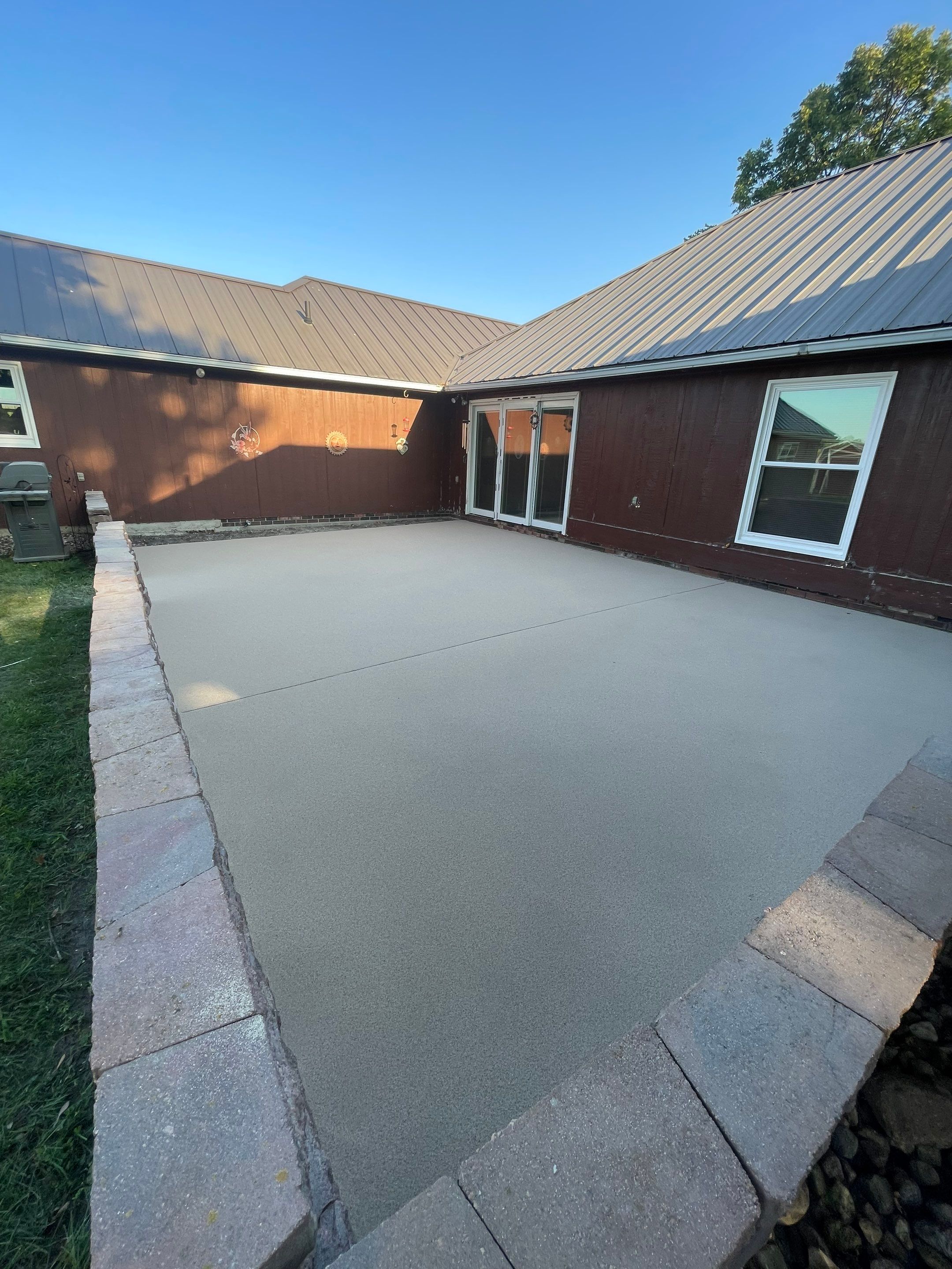 Concrete Patio Resurfacing and Protective Coating in Winfred, South Dakota by Select Painting, Coatings & Garage Cabinets
