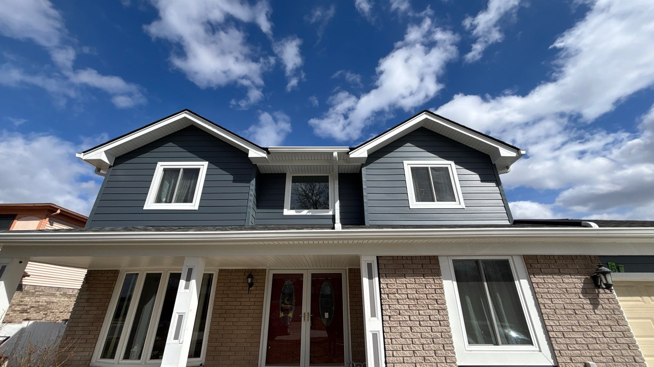 Siding Replacement using Alside Midnight Blue by 180 Contractors