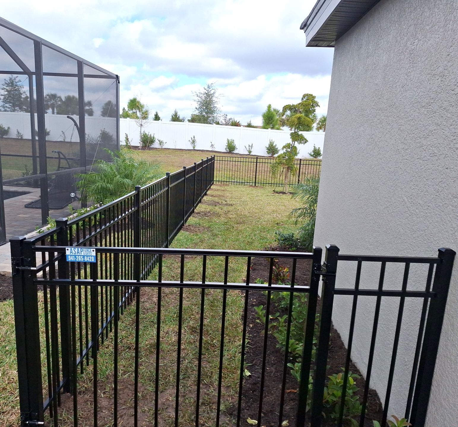 Aluminum Fence Installation using 4ft 3 Rail Black Aluminum Fence by Asap fence and gates, LLC