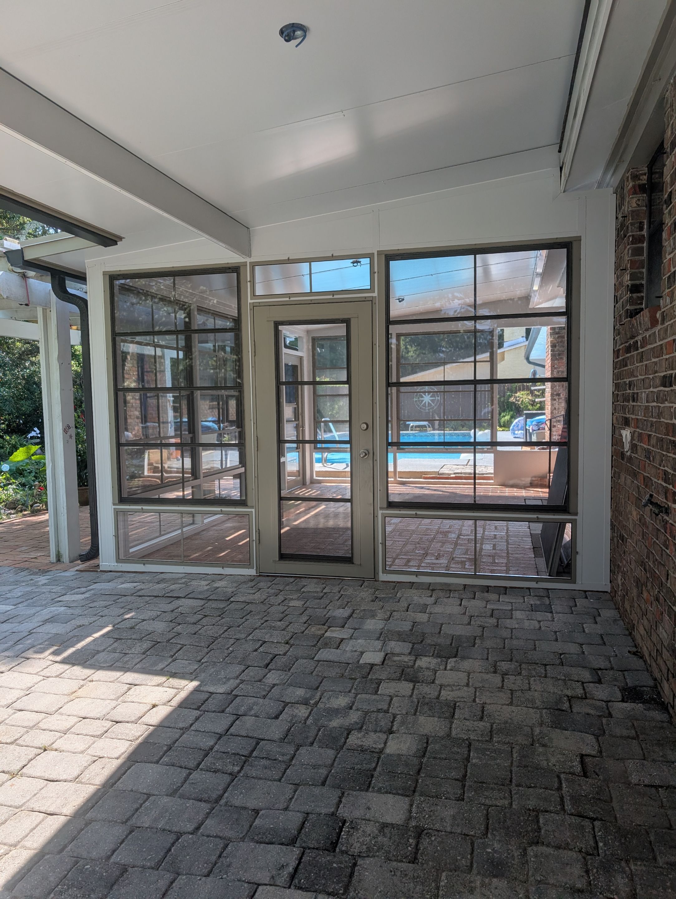 Pensacola Screen Room with Vinyl Slliders by Titan Sunrooms