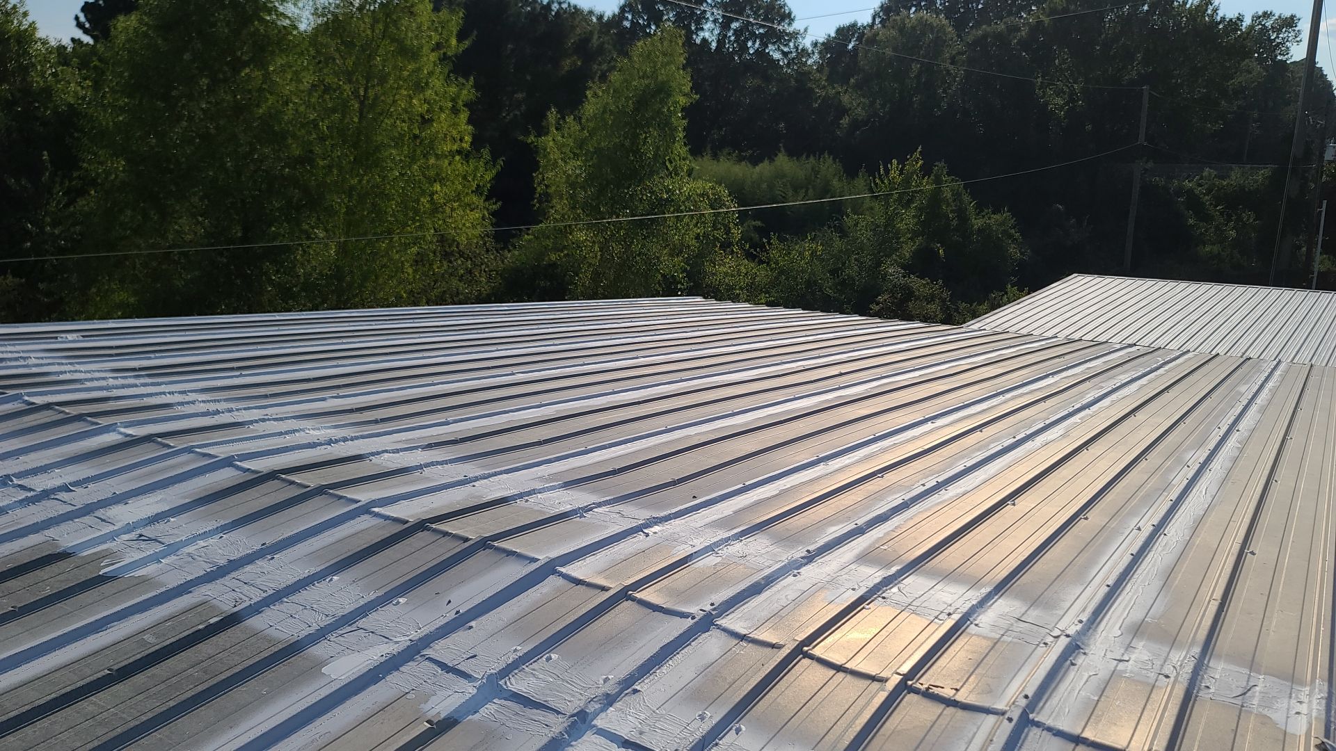 Commercial Metal Restoration System using Aldocoat Coatings by Hostetler Roofing