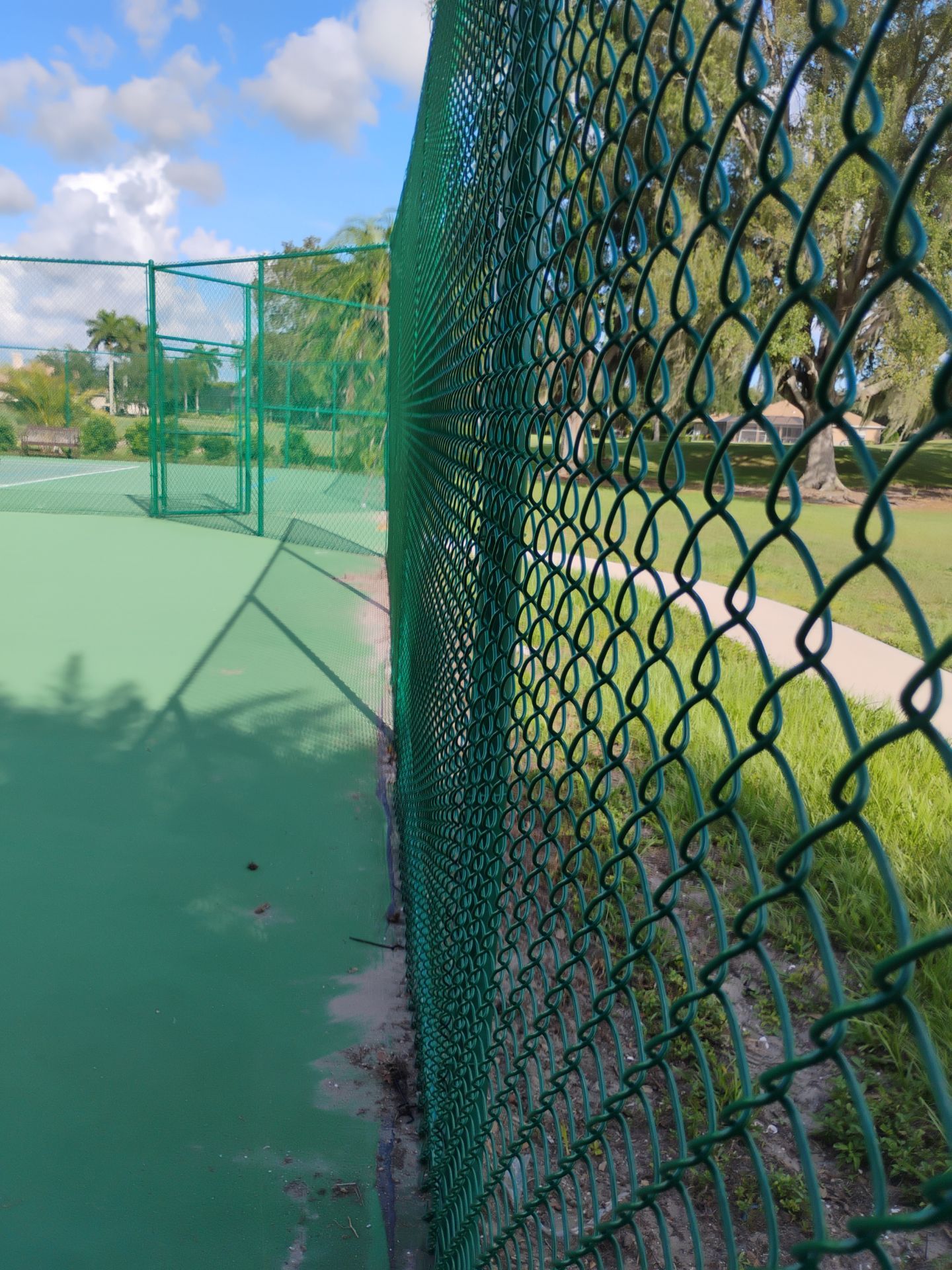 Commercial Tennis Court Chain Link Fence Repair in Sarasota by True Fence LLC