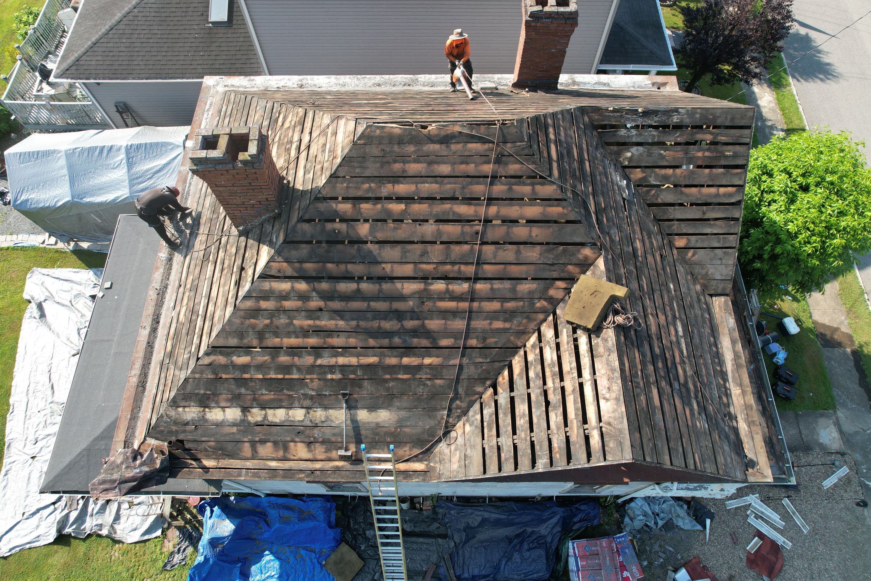 Residential Roofing Installation using GAF Timberline HDZ Charcoal by Rainstoppers Roofing