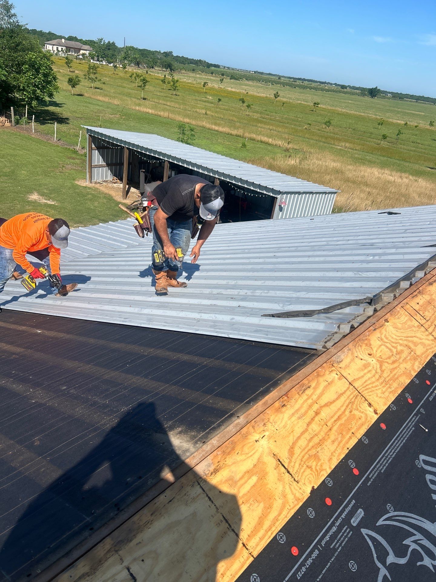 Residential Roofing Installation using Metal by Roof Repair Company