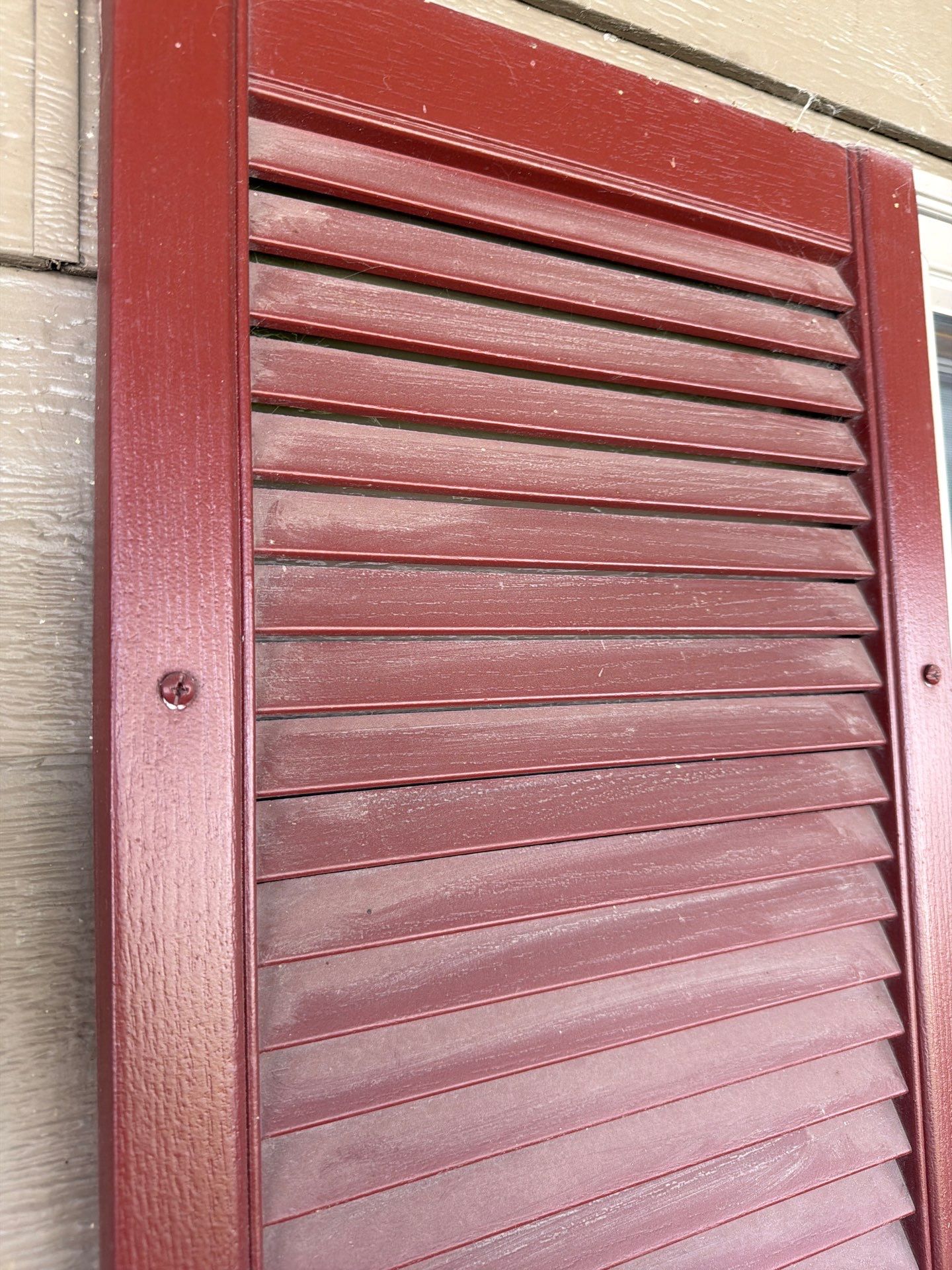 Residential Exterior Painting with Shutter and Trim Updates in Sioux Falls by Select Painting, Coatings & Garage Cabinets