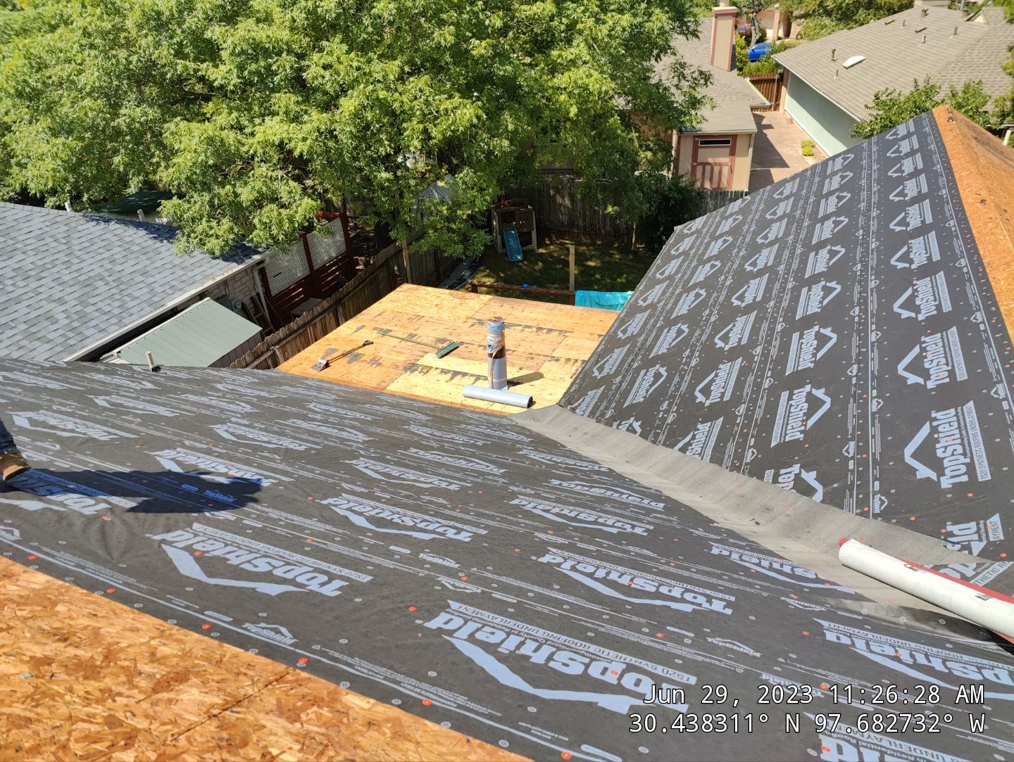 New Roof Installation Of IKO Dynasty Color Brownstone by DeZign Roofing & Exteriors