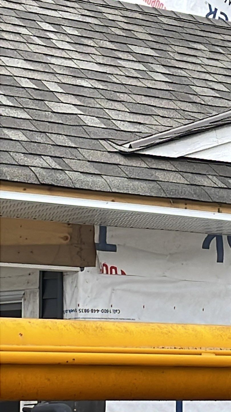 Residential Roofing Installation using OC Driftwood shingles by Top Notch Roofing Inc