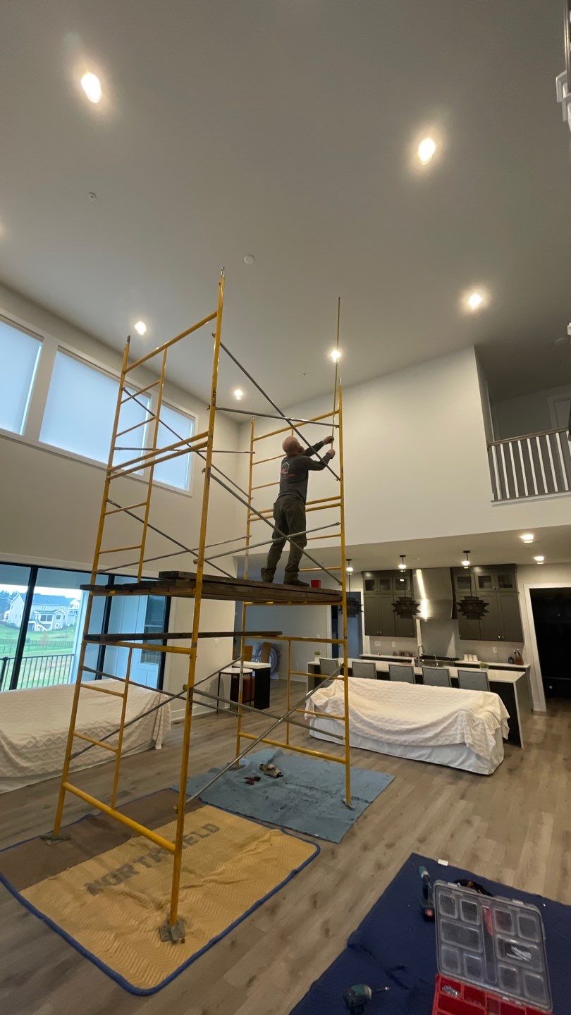 Chandelier Install  by HomeWerkes Design & Build