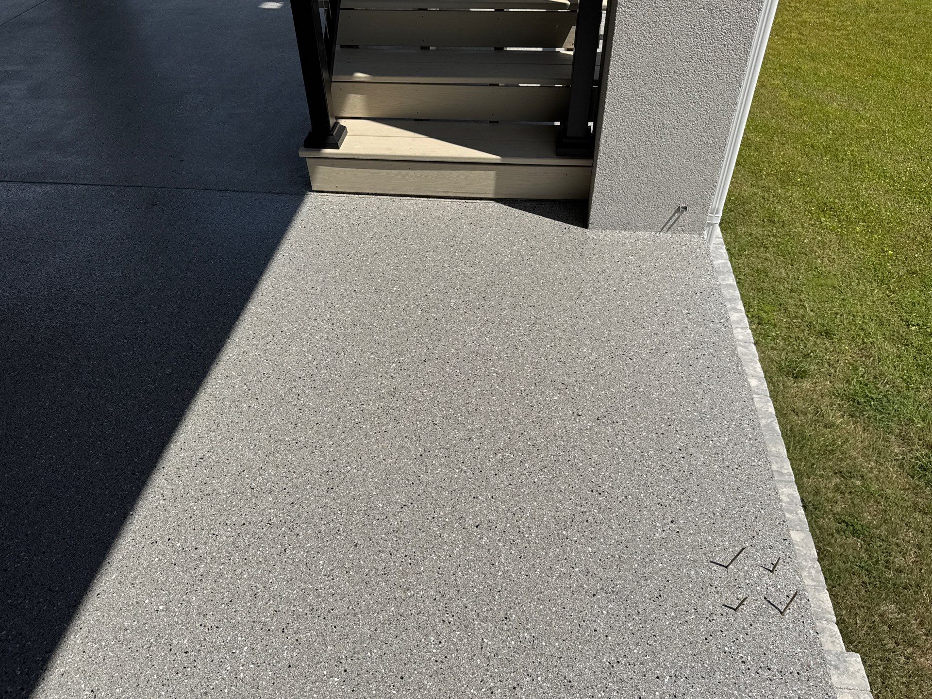 Under Side of Home in Hybrid Shale by Cross Creek Concrete Coatings
