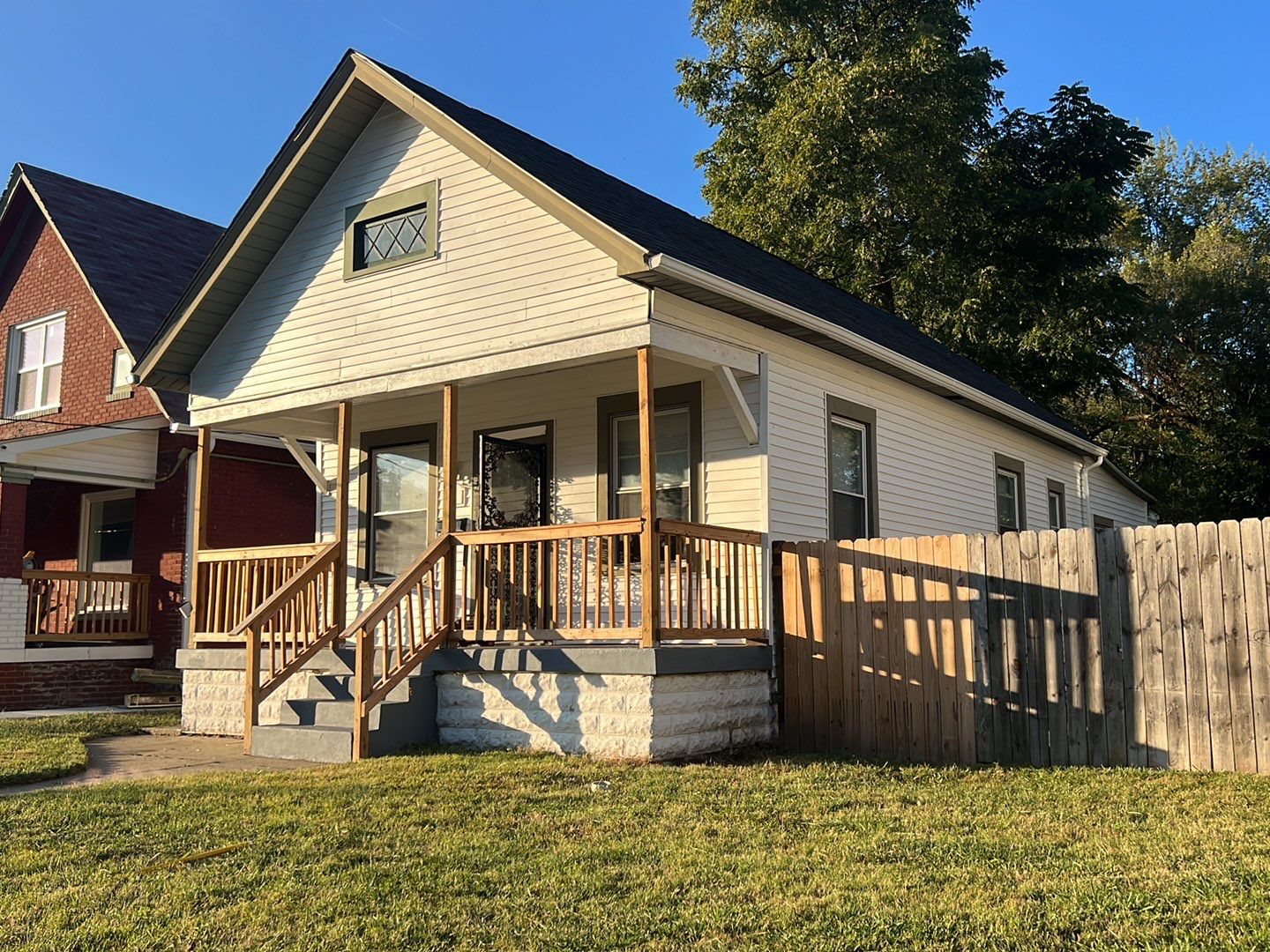 Rental Property Restoration, siding, flooring, gutters, landscaping by Storm Contracting 