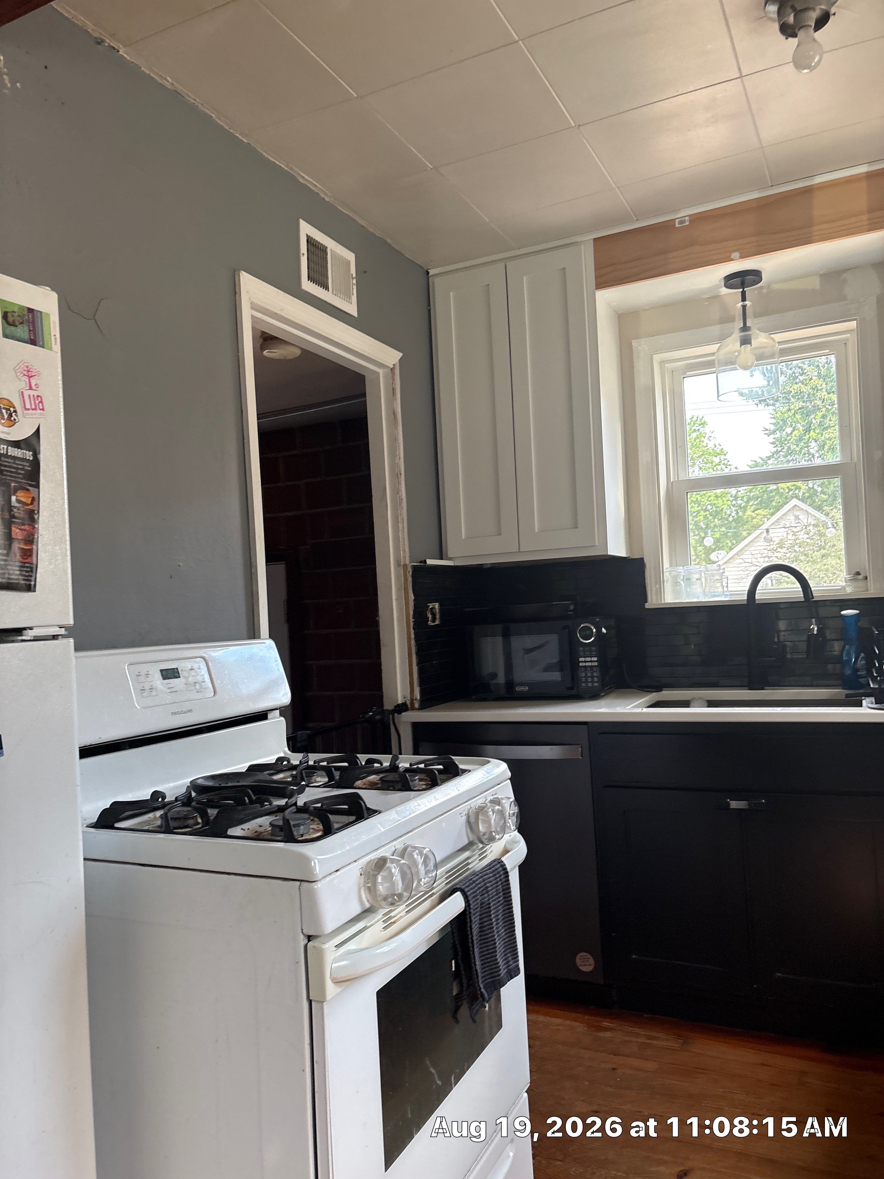 Modern Two-Tone Kitchen Remodel with Quartz Countertops in Lincoln by CompanyCam Sales Demo