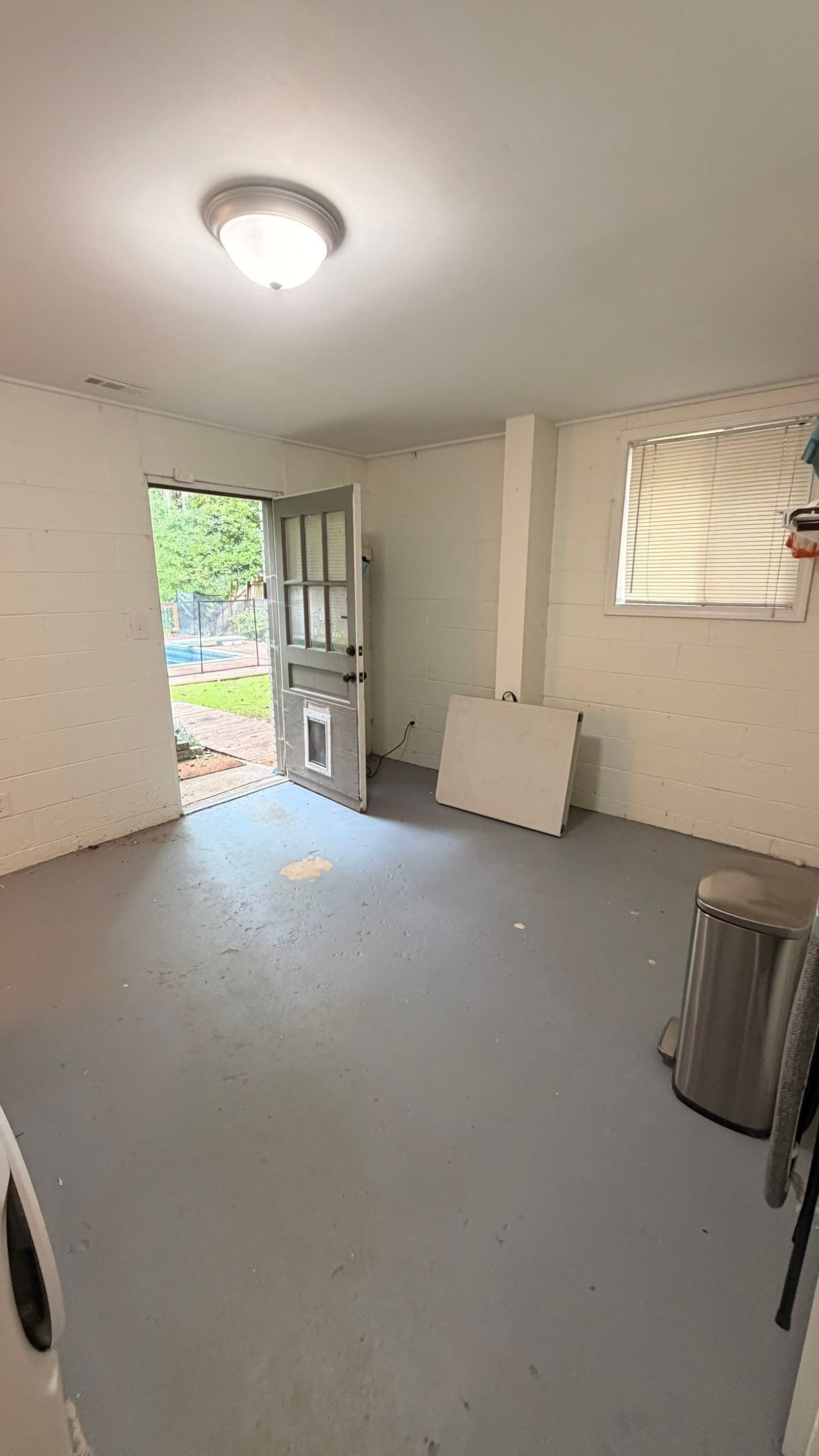 Basement Remodeling with Wood-Look Flooring and Custom Wainscoting in Dunwoody by Swift Home Renovations