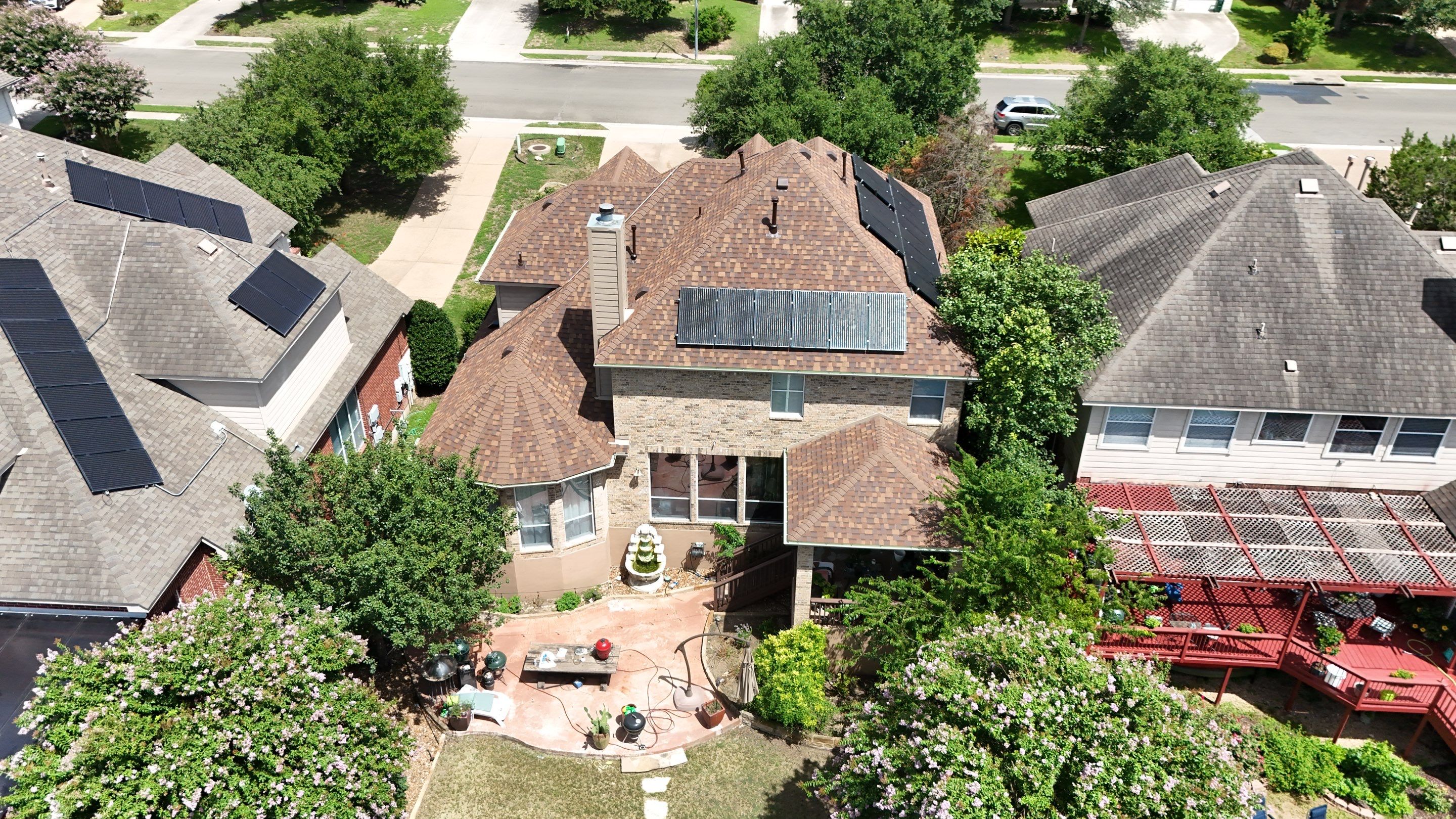 Residential Roof Replacement using Owens Corning - Duration - Desert Rose by Action Exteriors Austin