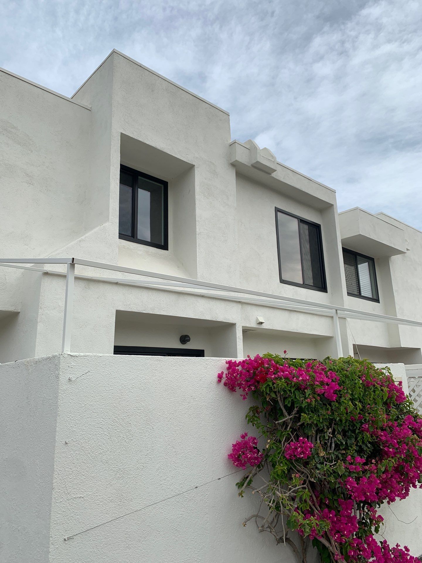 Window Installation using AMSCO Black Vinyl Windows by American Window Company