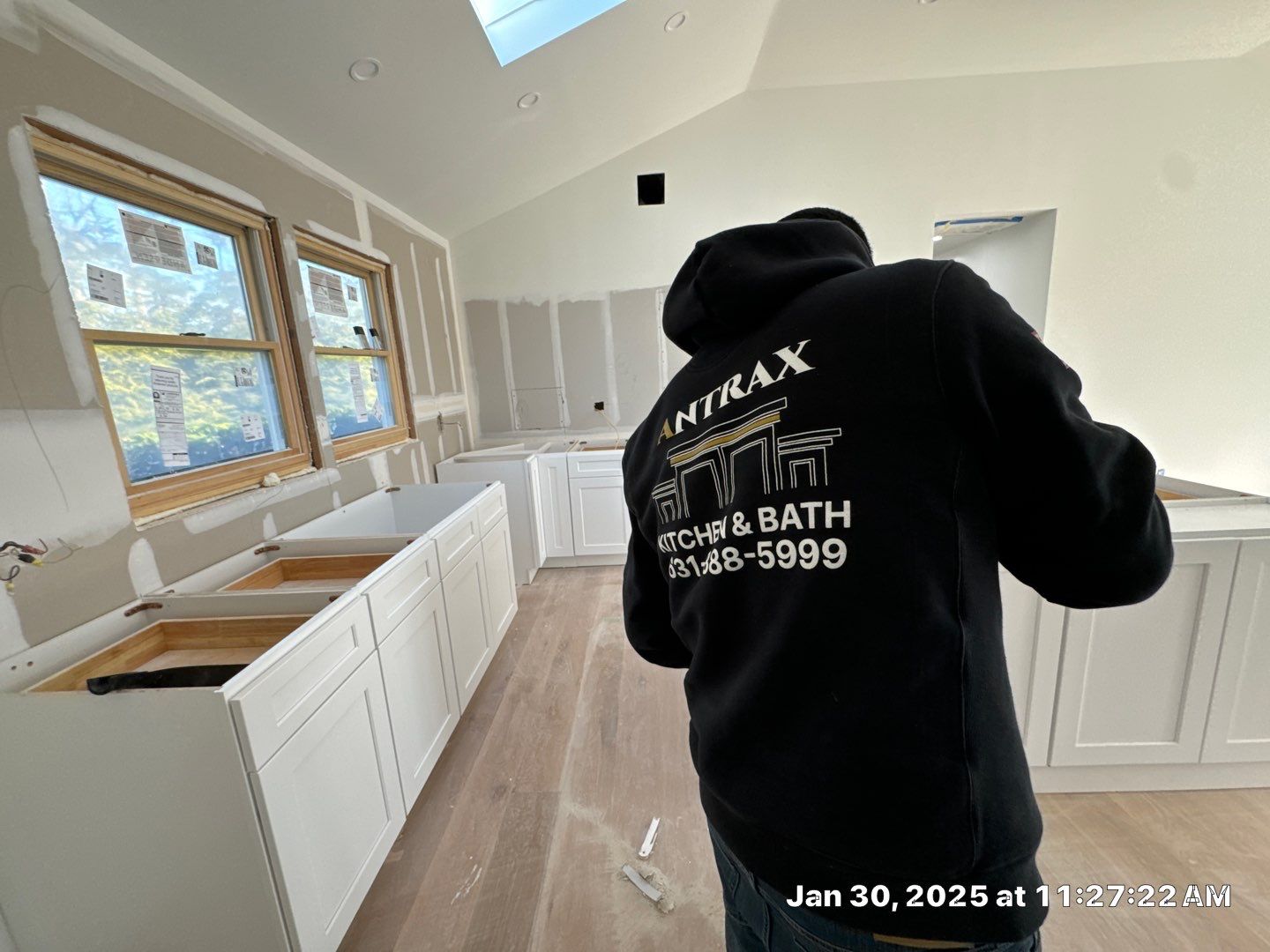 Cabinet Installation using white shaker by Antrax Corp