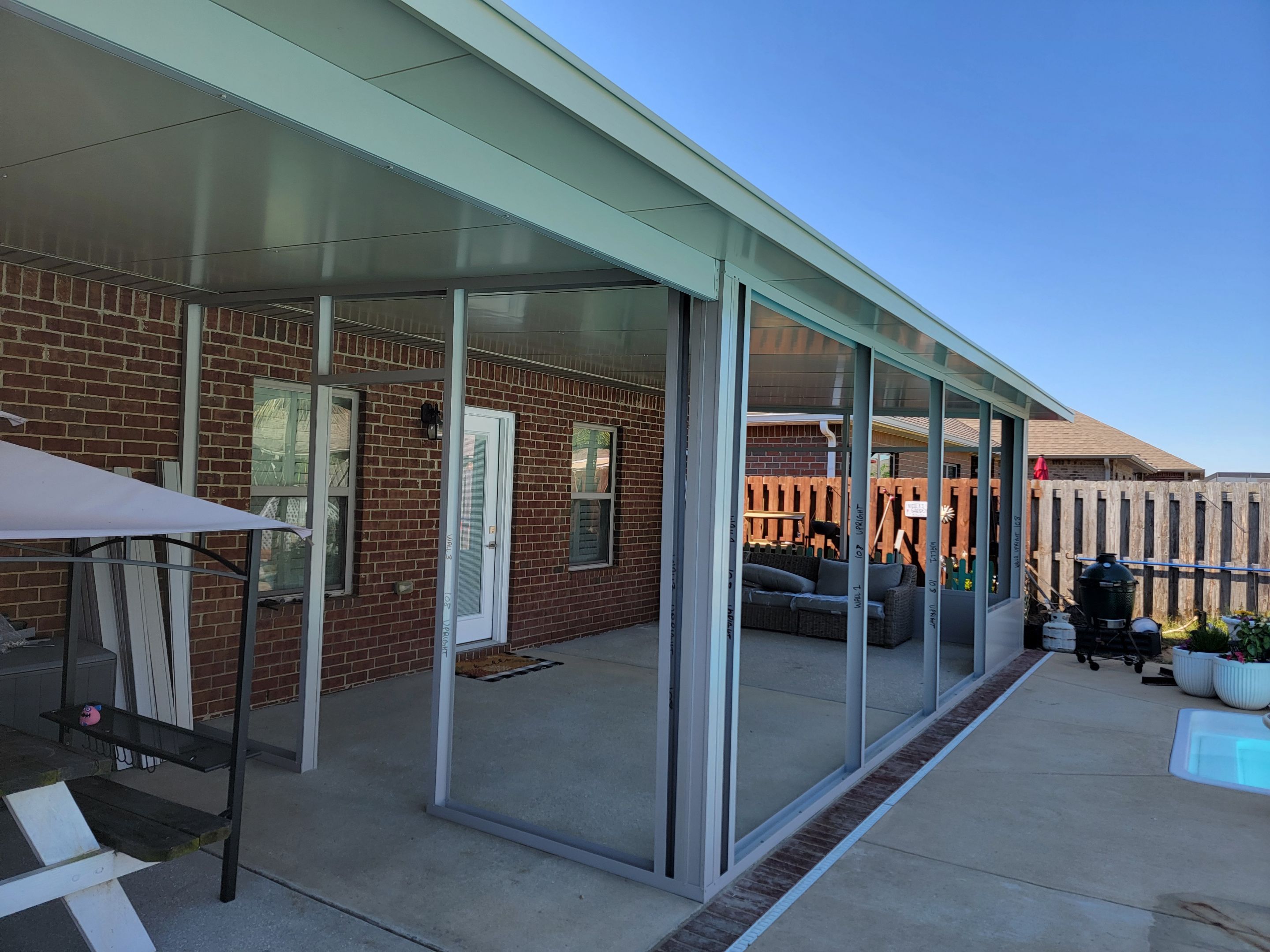 Poolside Screen Room & Patio Cover in Gulf Breeze by Titan Sunrooms
