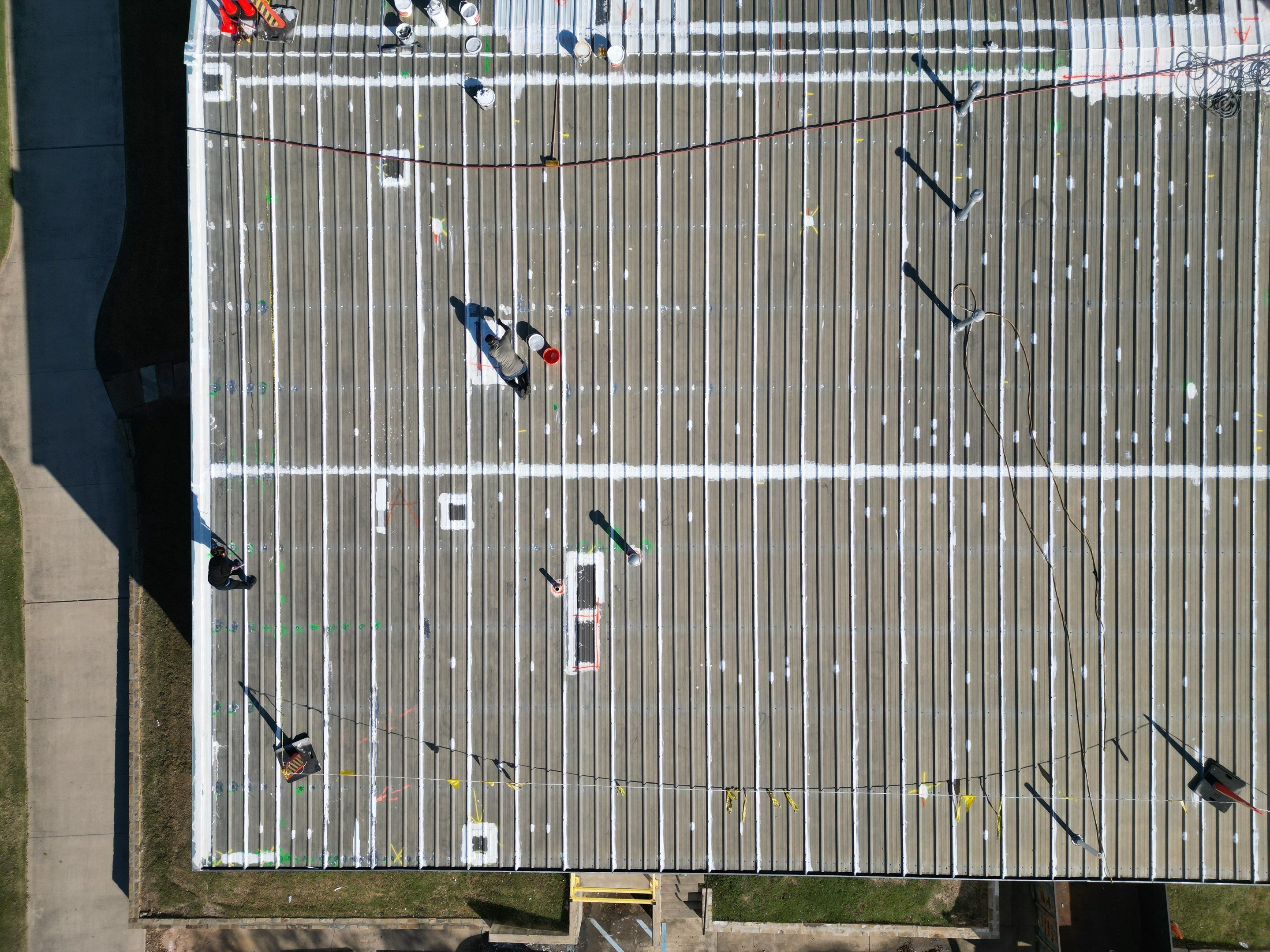 Silicone Coating Metal Rehab by First Out Roofing 