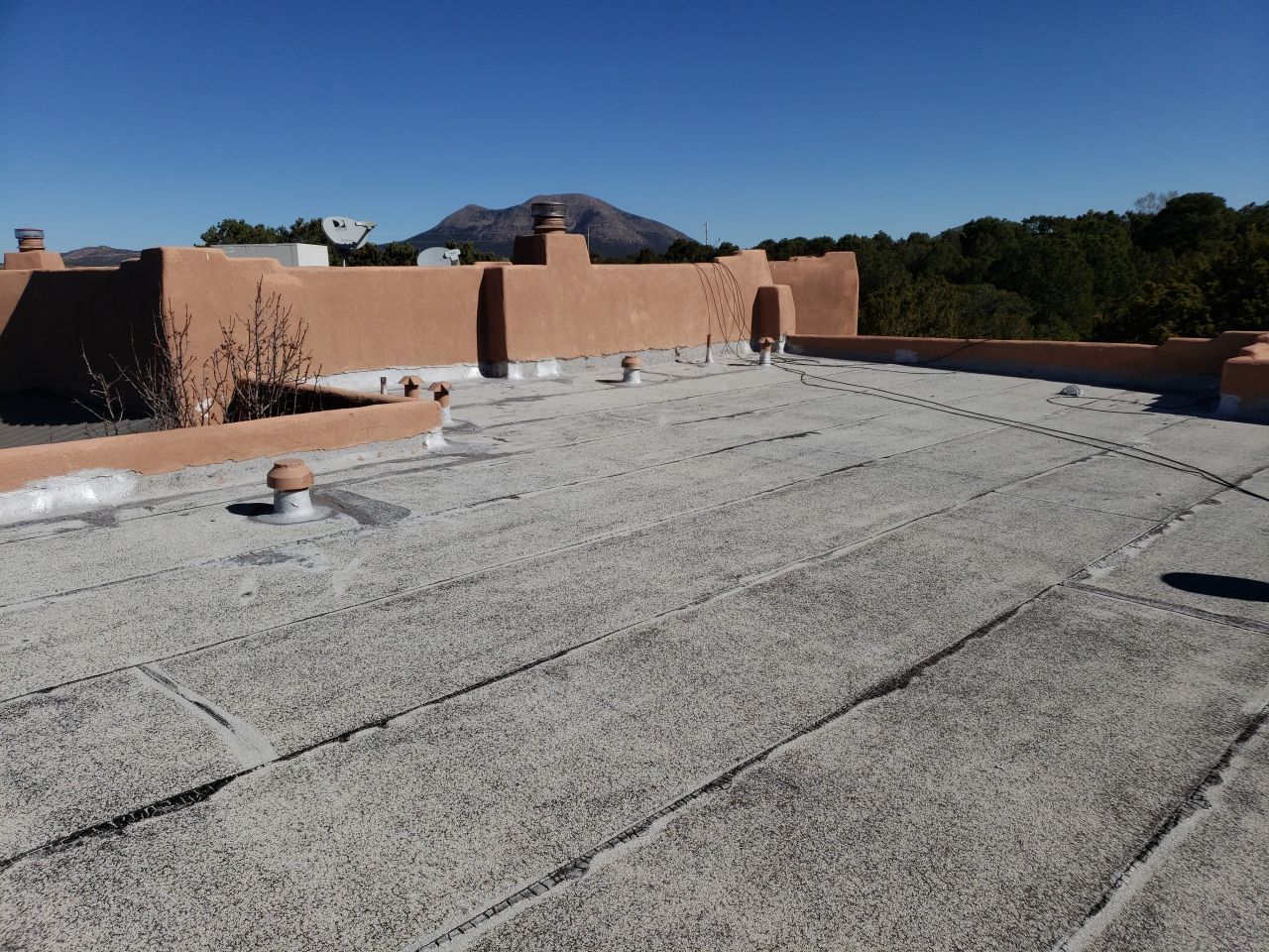 Brunacini Rd • Sandia Park, NM 87047 by Doyle Roof Masters Inc