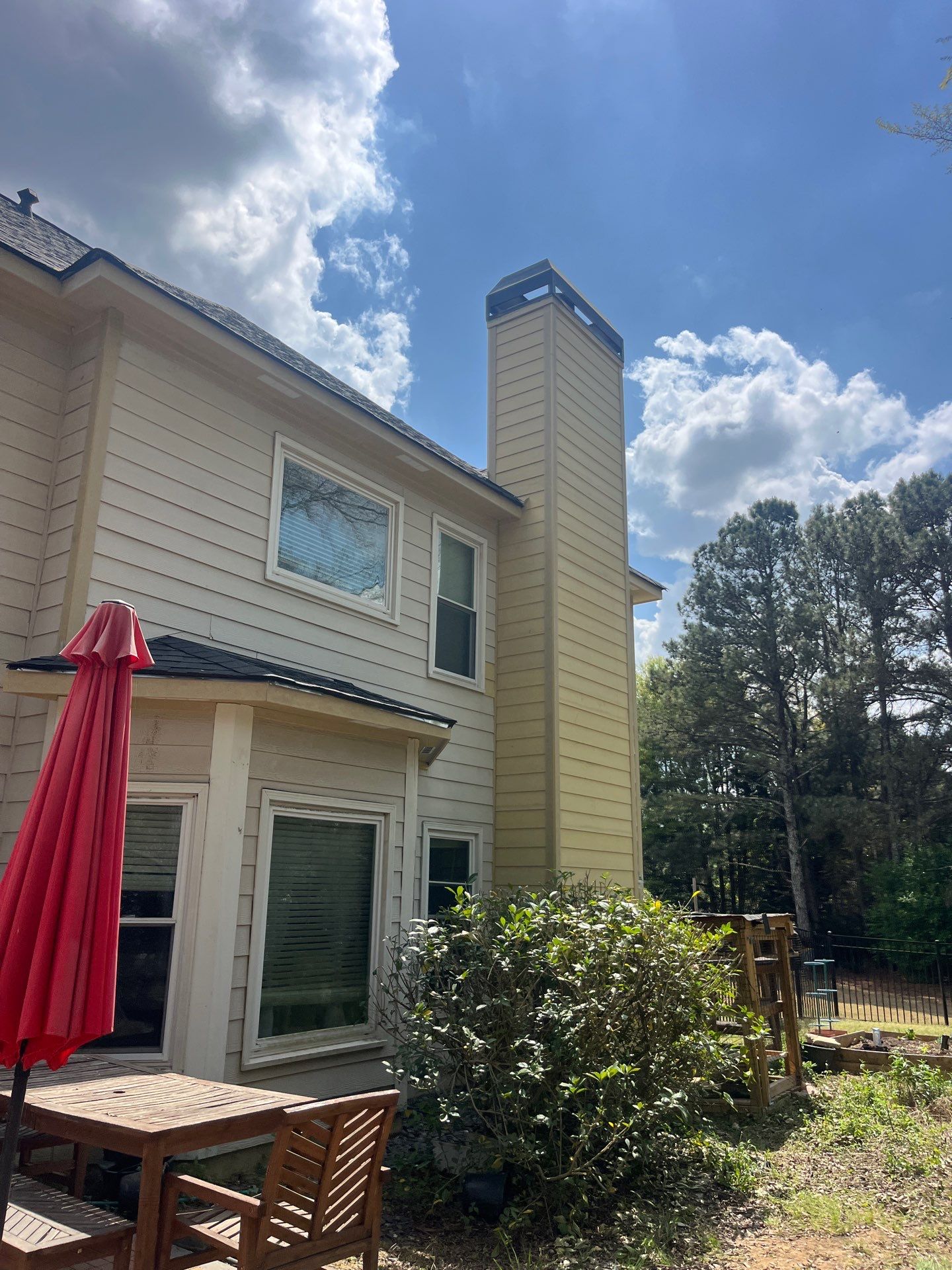 Marietta, GA Chimney Siding, Fascia, and Soffit Replacement using James Hardie Lap Siding, Hardie Trim, and Hardie Panel by Nelson Exteriors 