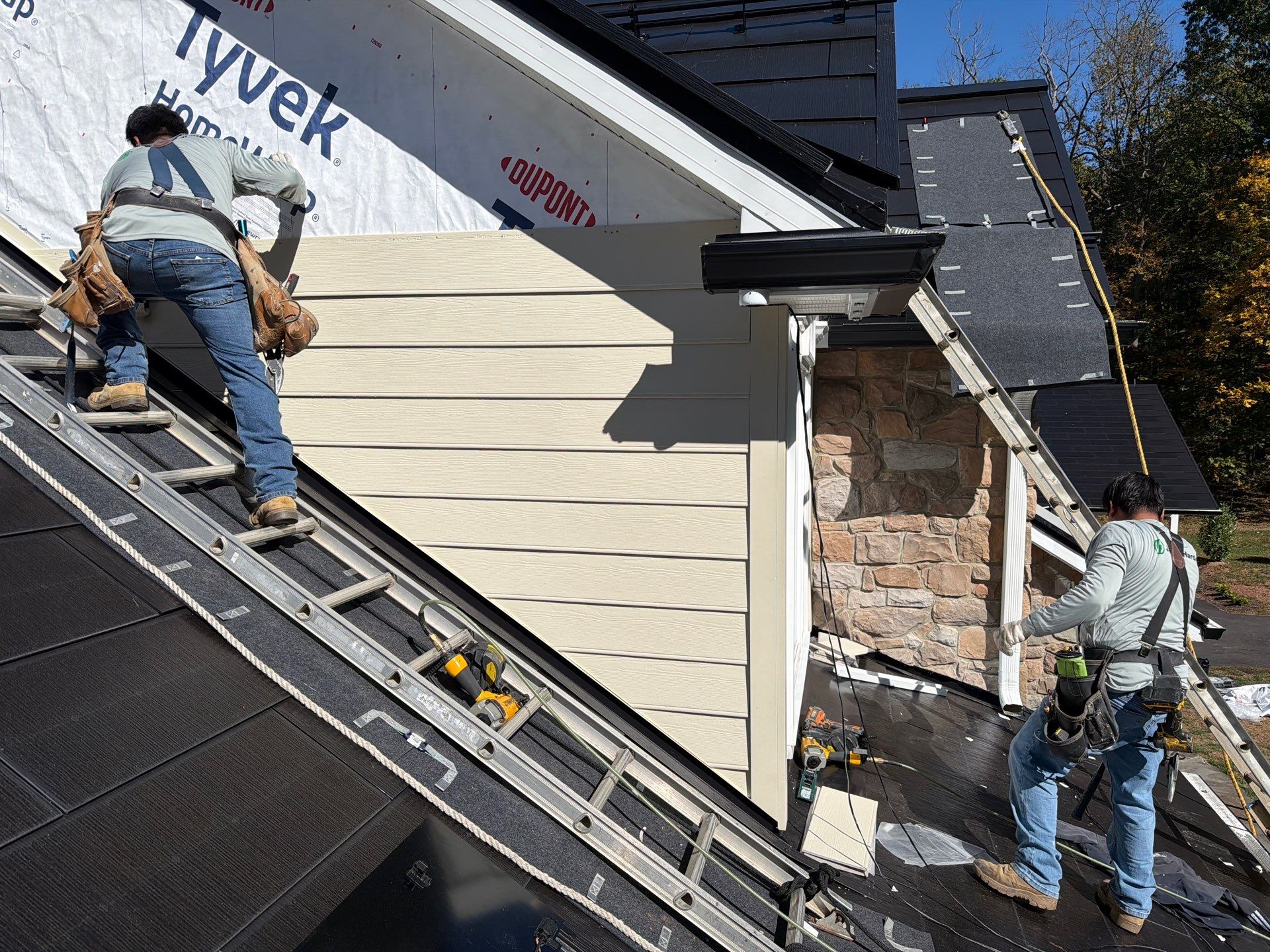 Beautiful James Hardie Siding & Tesla Solar Roof by American Home Contractors