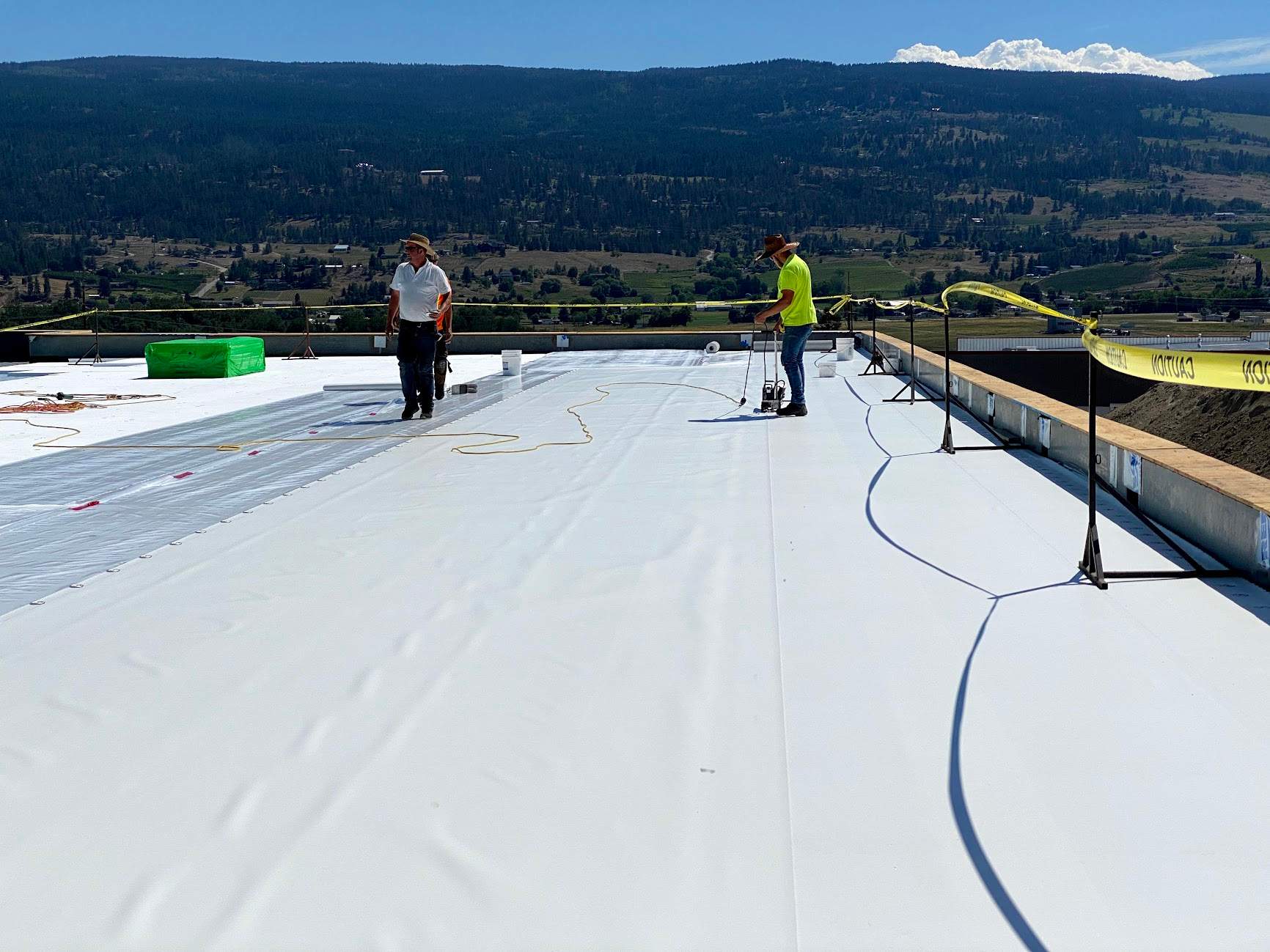 Commercial Roofing Installation using Durolast by Top Notch Roofing Inc