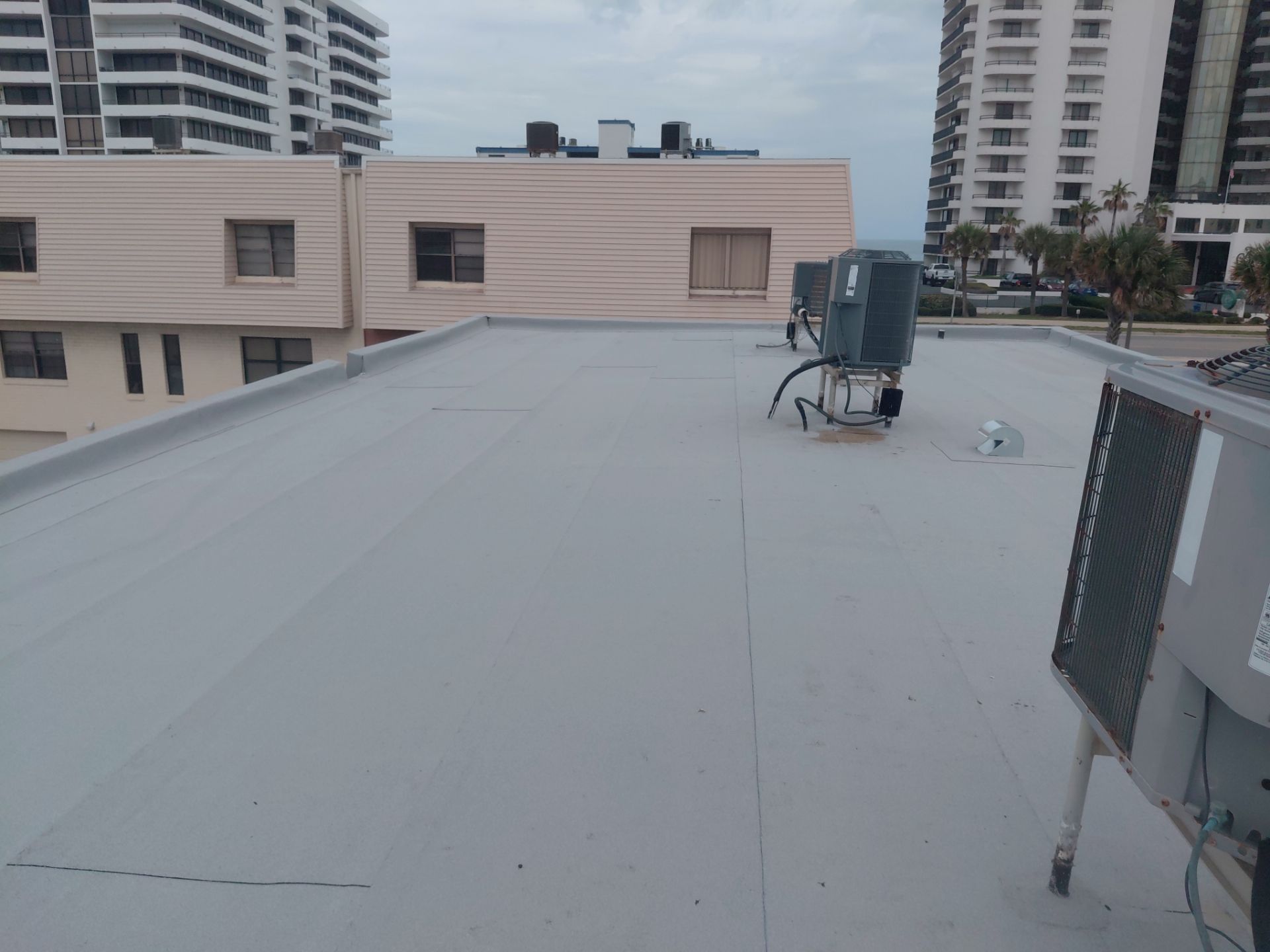 Flat Reroof Replacement Daytona Beach Shores FL by Pinnacle Roofing Group