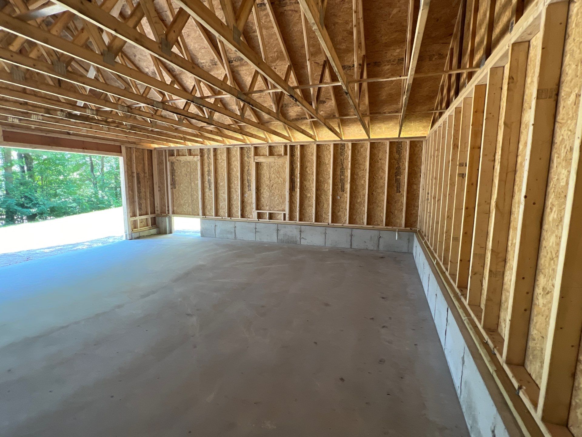 Garage using LP SmartSide Panel Siding by Chagnon Building & Remodeling LLC