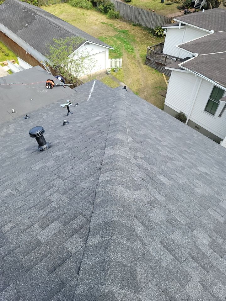 Residential Roofing Installation using Roof Replacement by American Roofing & Construction LLC