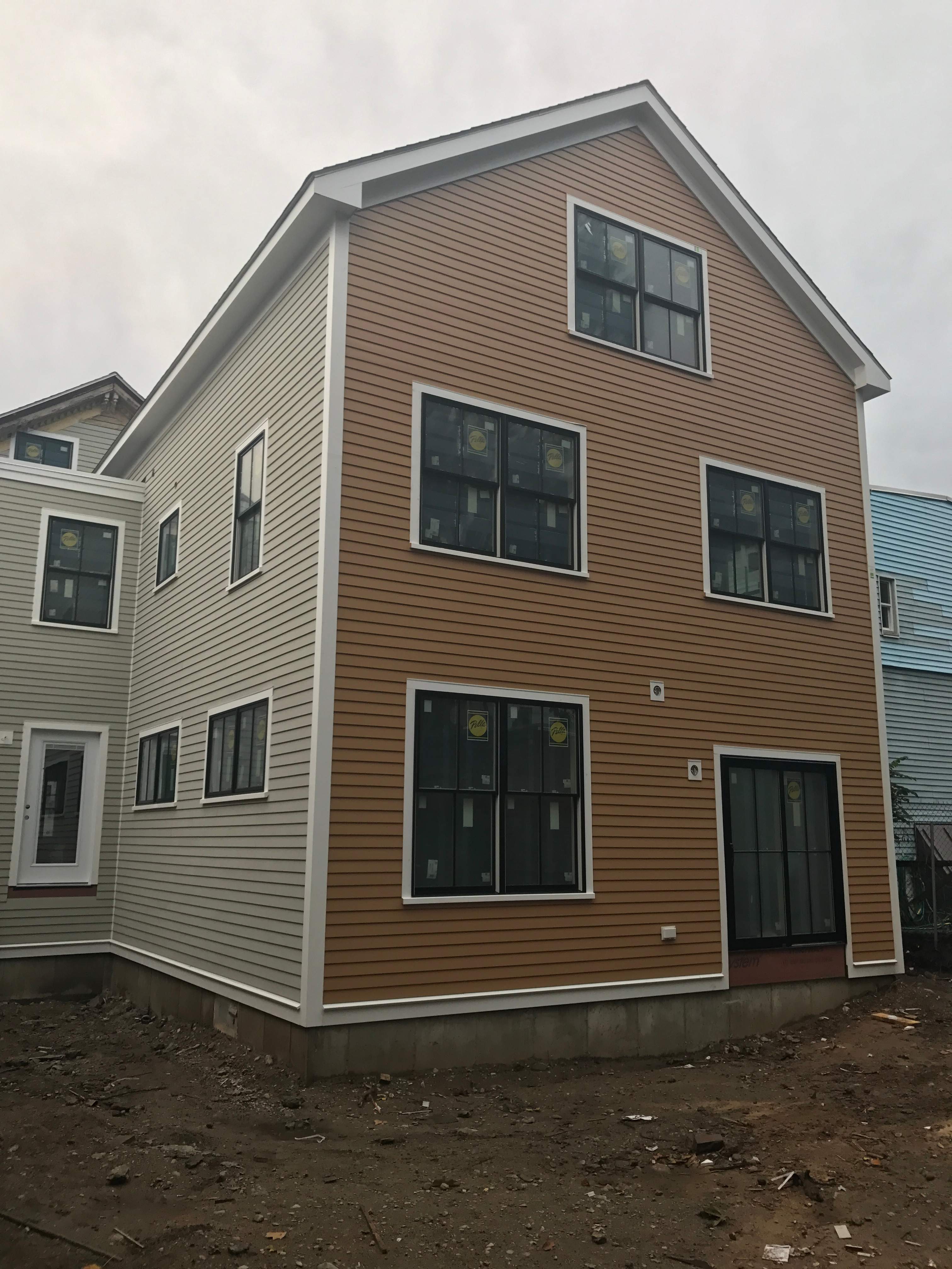 Siding Installation using Wood Clapboards by UBrothers Construction