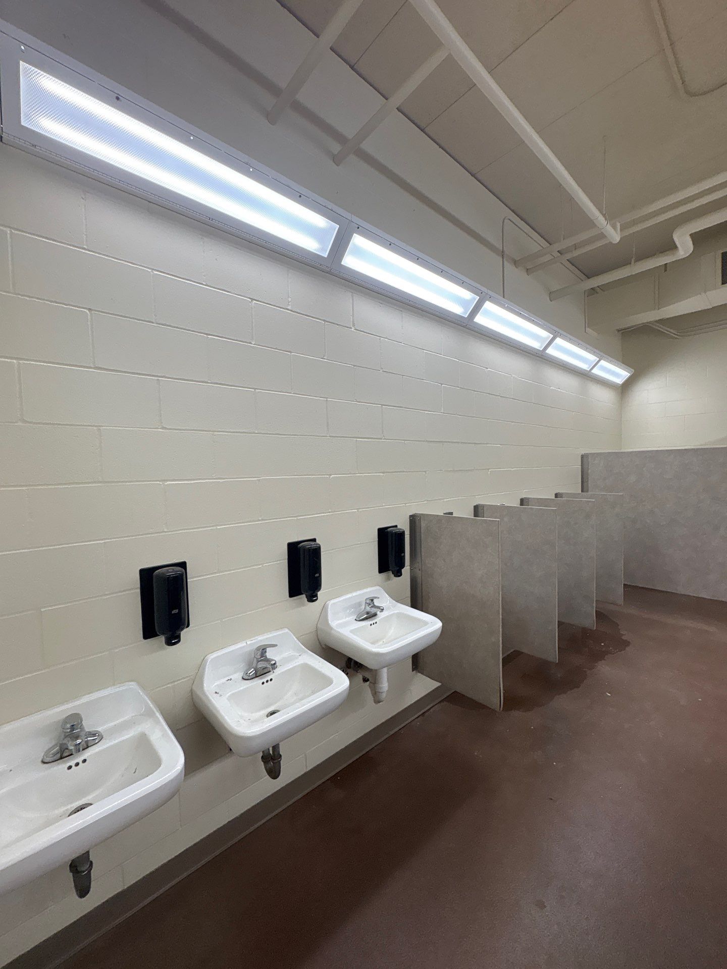 Commercial Restroom Interior Painting and Facility Updates in Sioux Falls by Select Painting, Coatings & Garage Cabinets