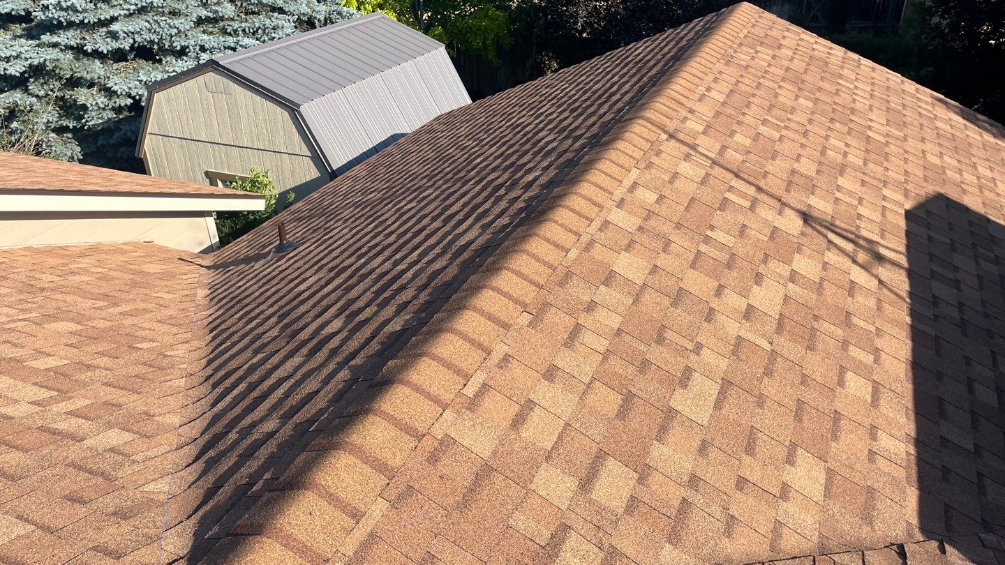 Stunning Roof Transformation in Mountain Home with Desert Tan Shingles by ID Roofing LLC