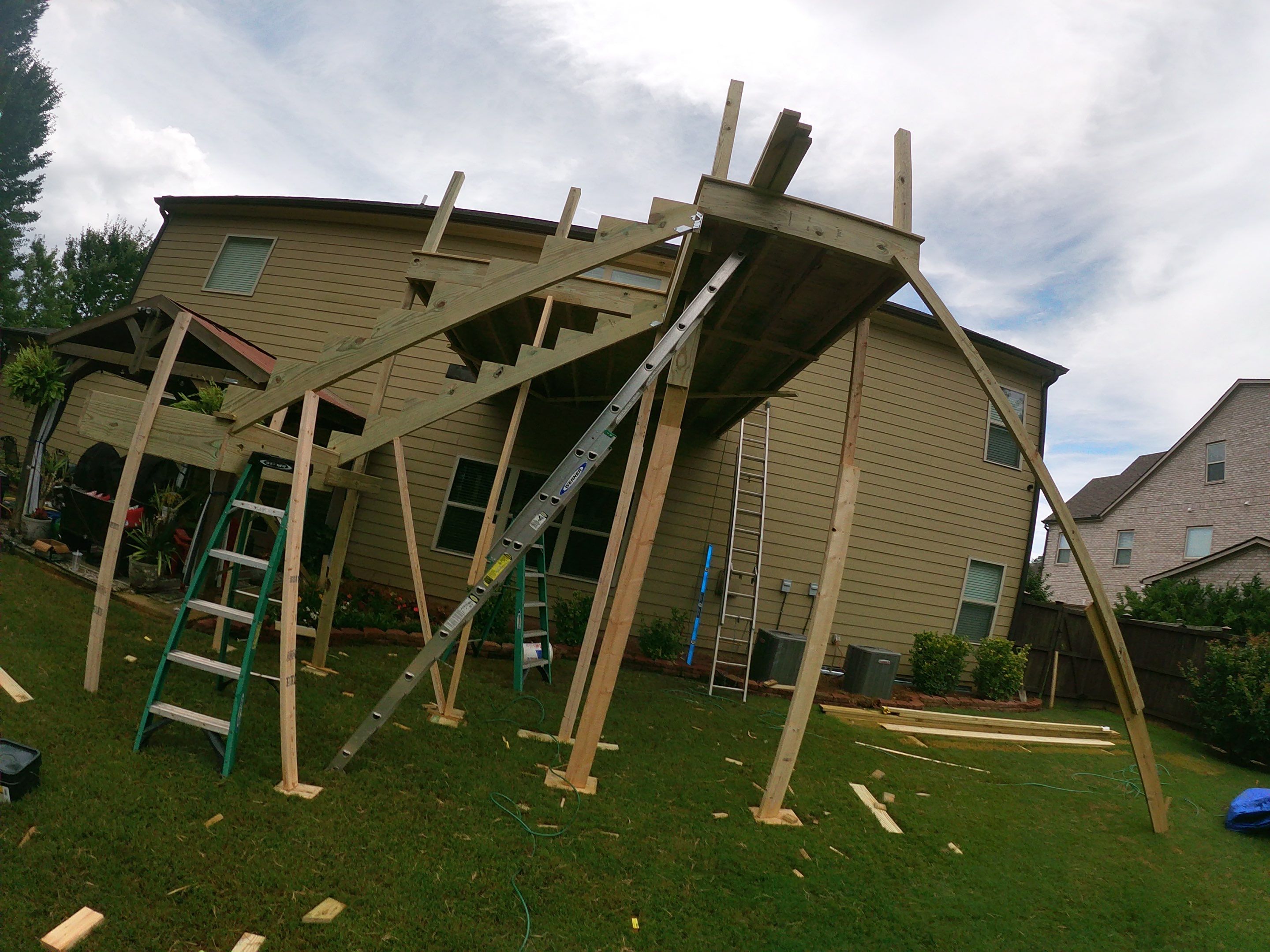 Pressure-Treated Wood Deck and Staircase Construction in Cumming, Georgia by Swift Home Renovations