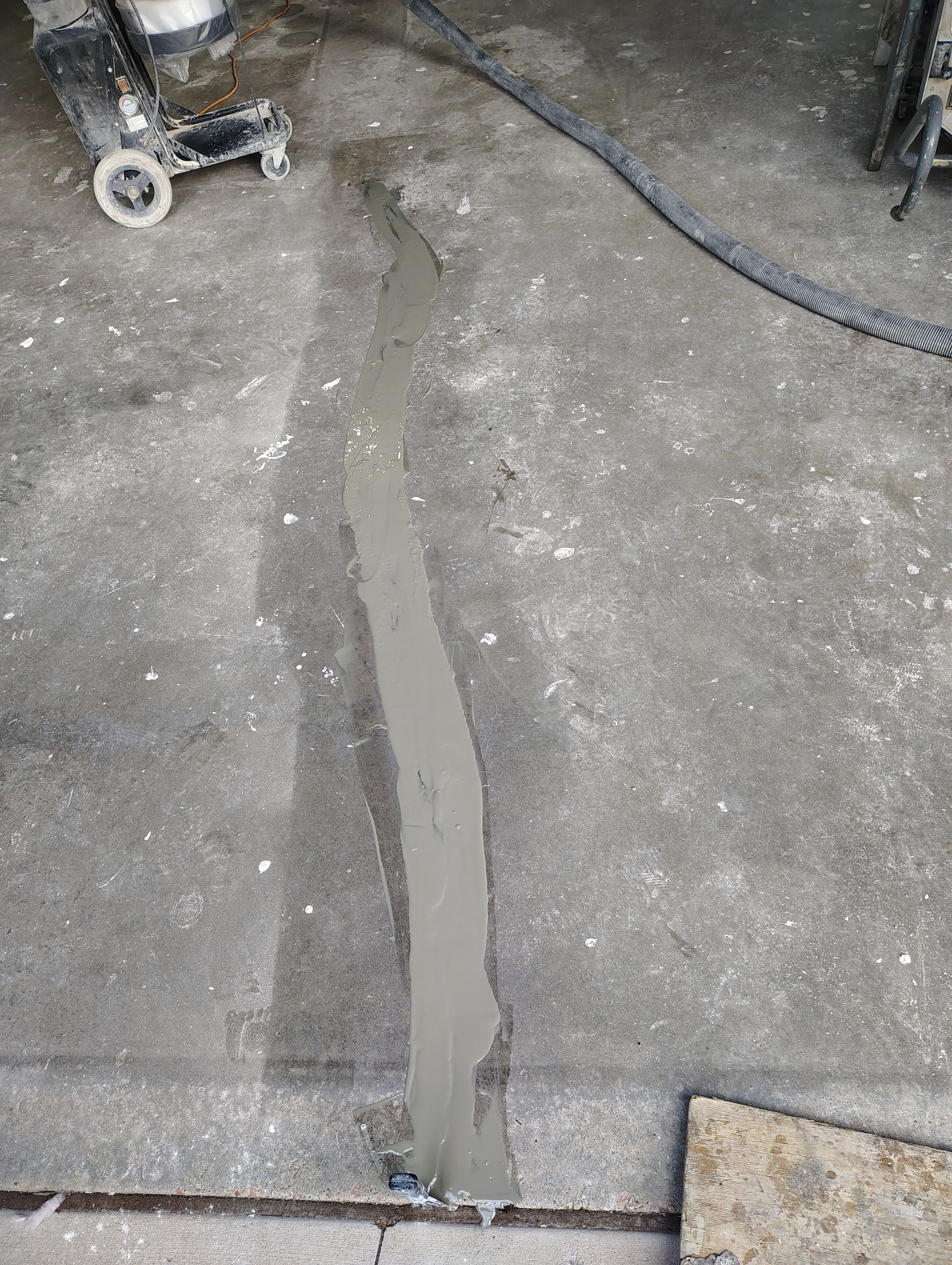 Sioux Falls Garage Floor Coating with Speckled Flake Finish by Select Painting, Coatings & Garage Cabinets