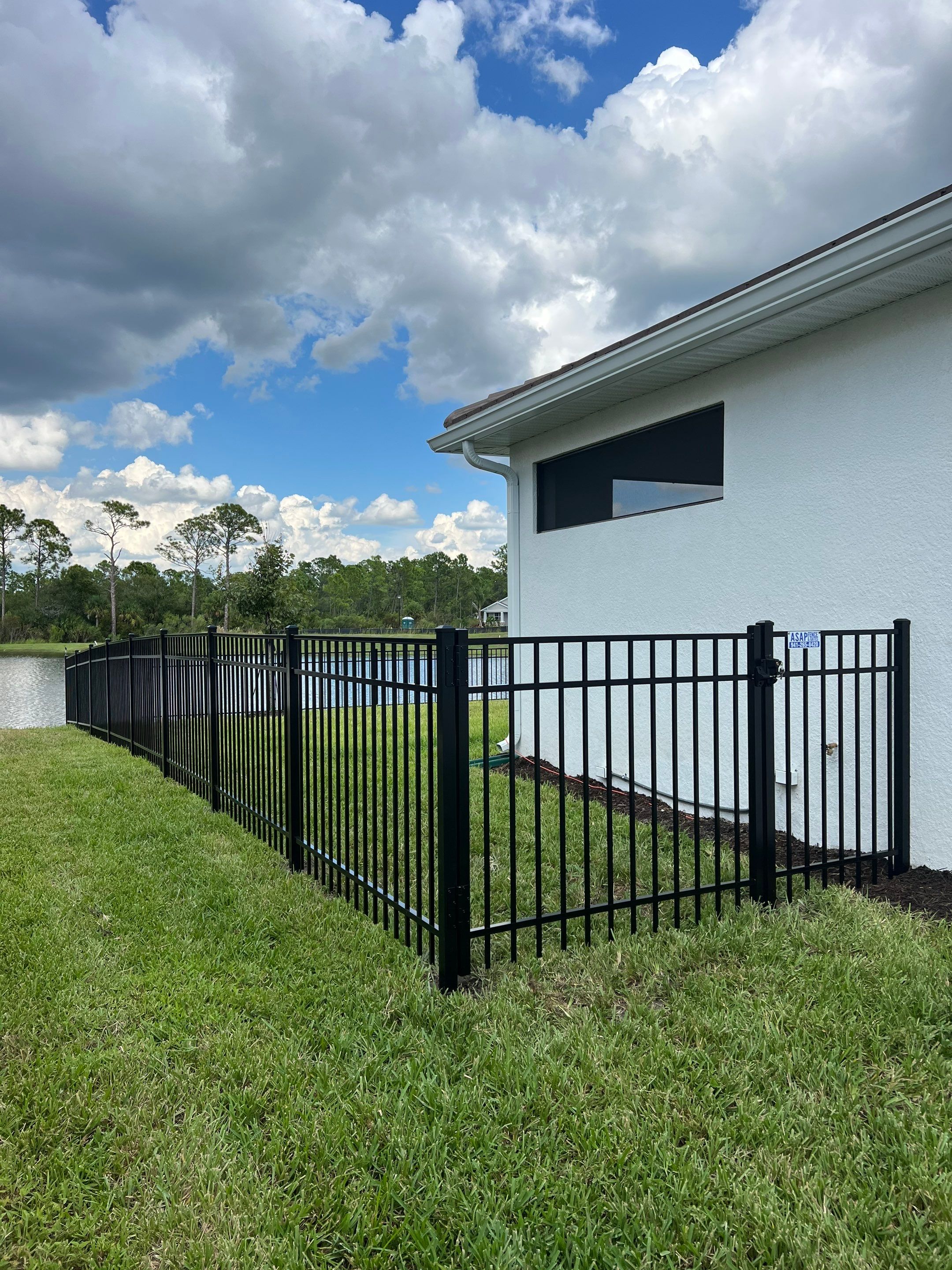 Aluminum Fence Installation using Black 3 Rail Aluminum Fence by Asap fence and gates, LLC