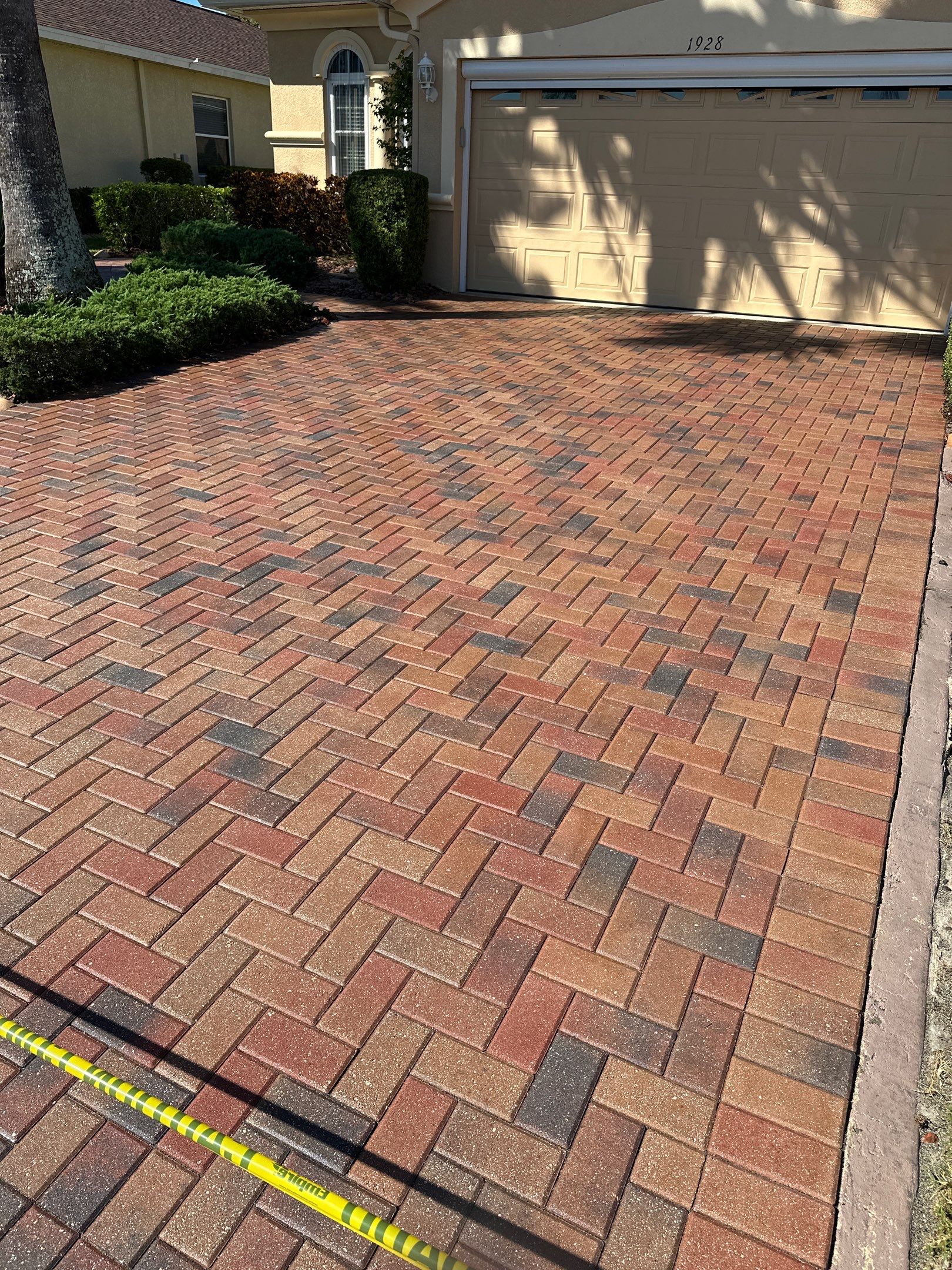 Restoring Multi-Tone Paver Driveway and Walkways in Sun City Center by Supreme Paver Experts