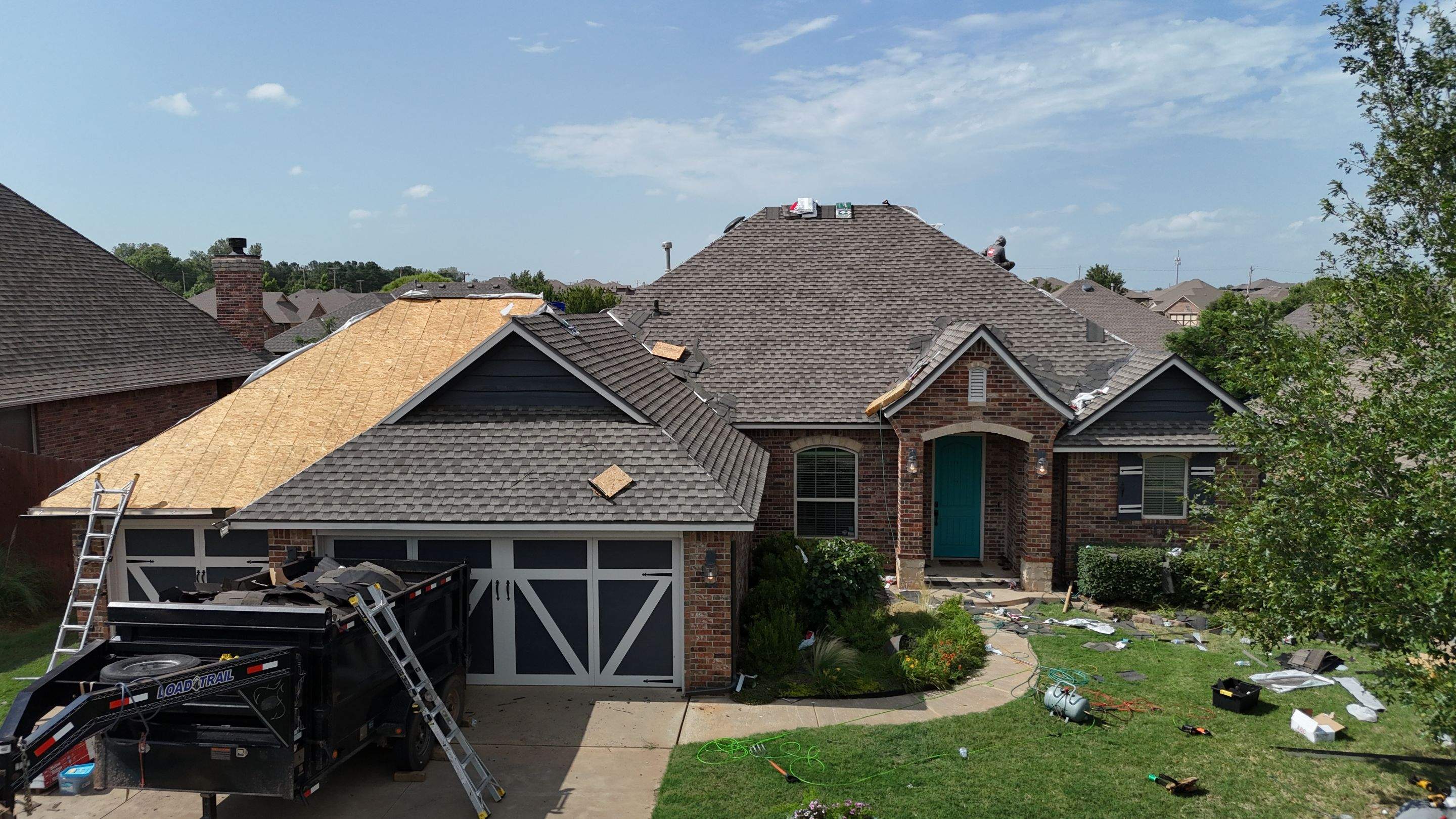 GAF Architectural Shingle Roof Replacement and Decking Repair in Mustang by 5Coat Roofing & Construction
