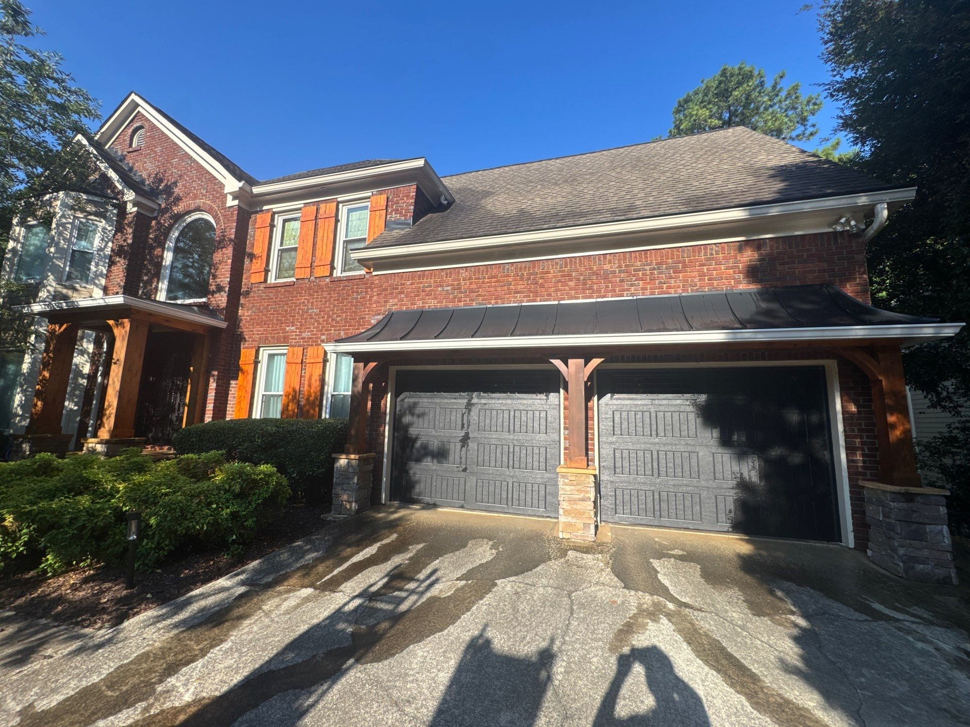 Exterior Modernization Featuring New Siding and Custom Wood Portico by Swift Home Renovations