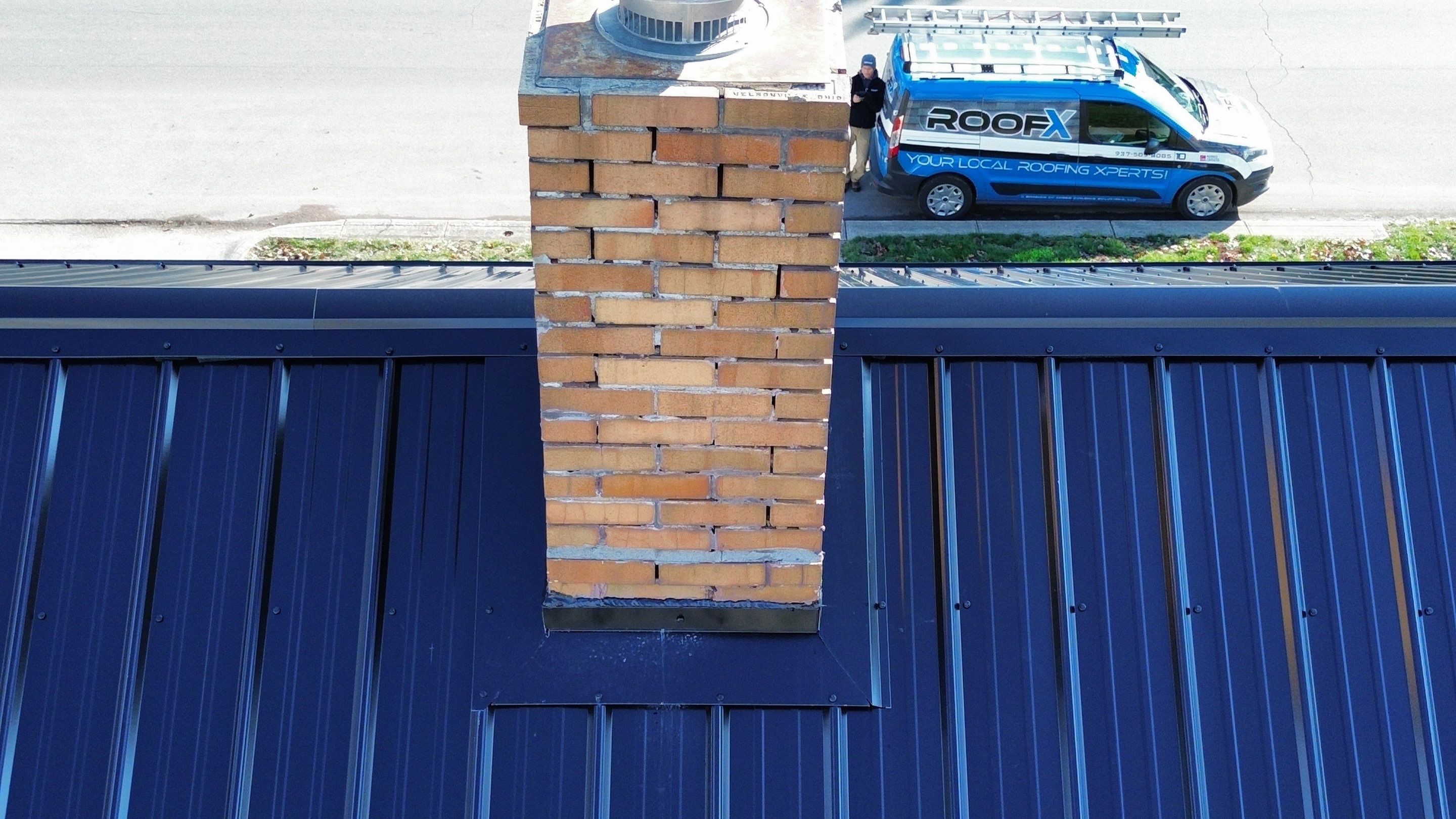 Residential Roofing Installation using Perfromance Panel Metal - Black by RoofX 