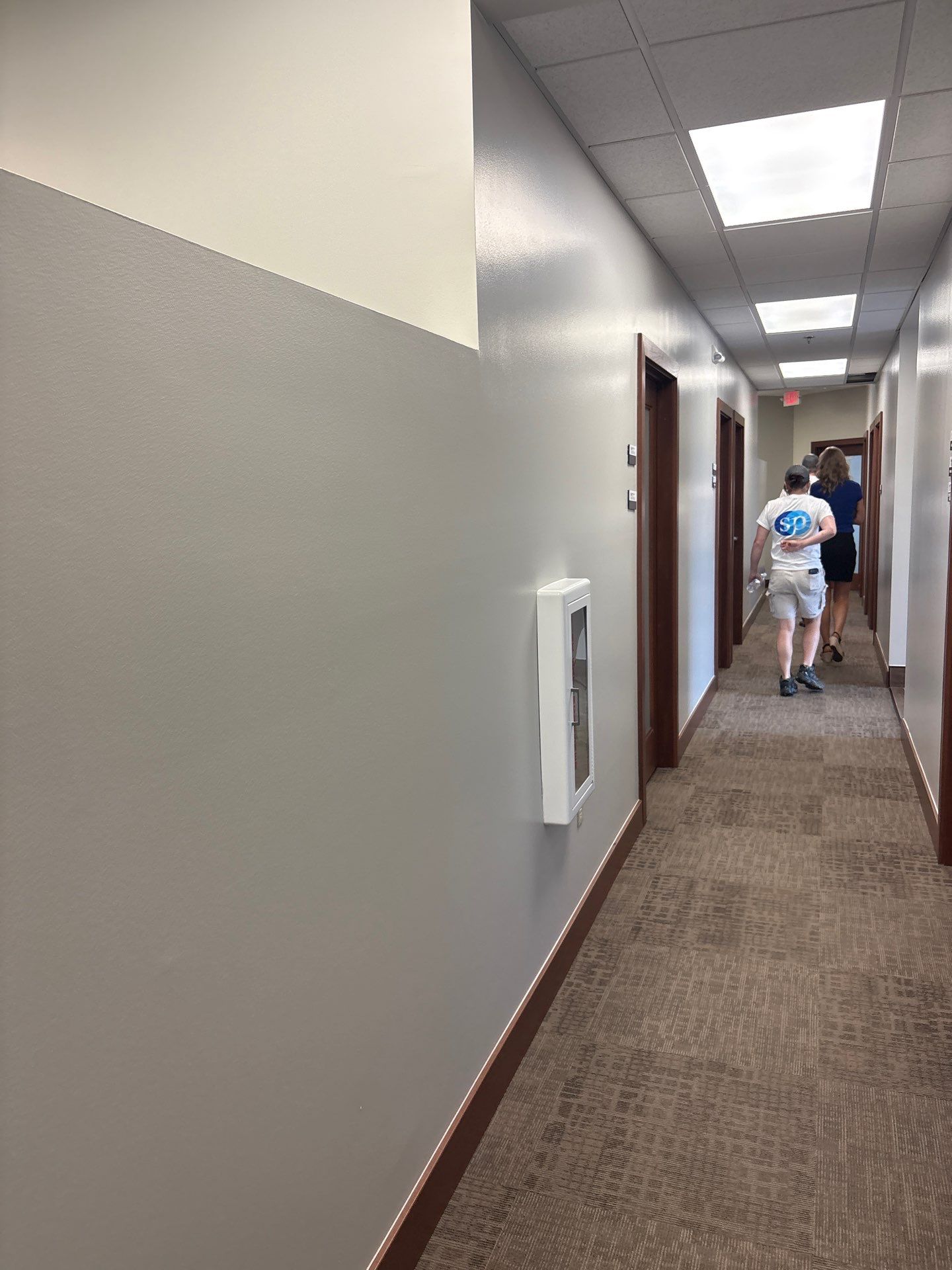 Commercial Office Interior Remodel and Modern Suite Refresh in Sioux Falls by Select Painting, Coatings & Garage Cabinets