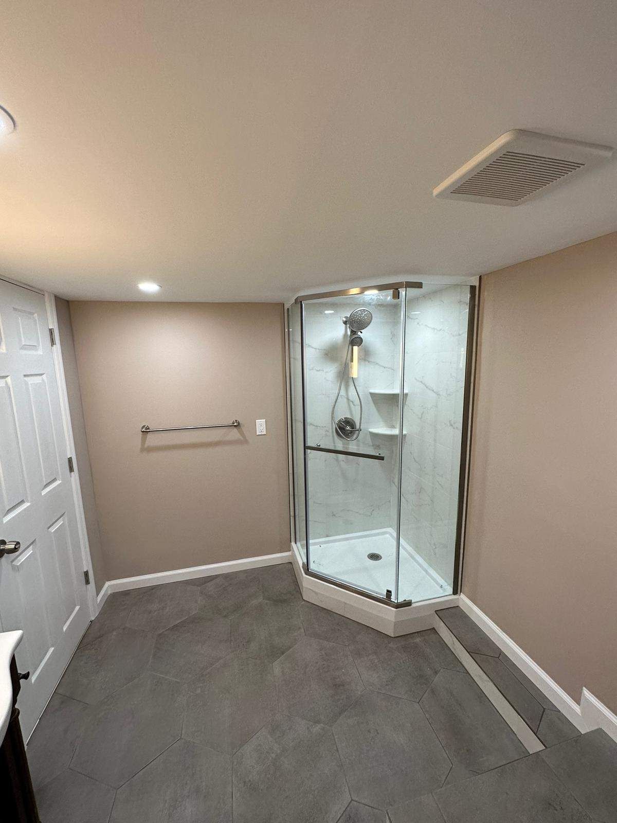 Bathroom Remodel using Tile by Home Concepts Construction