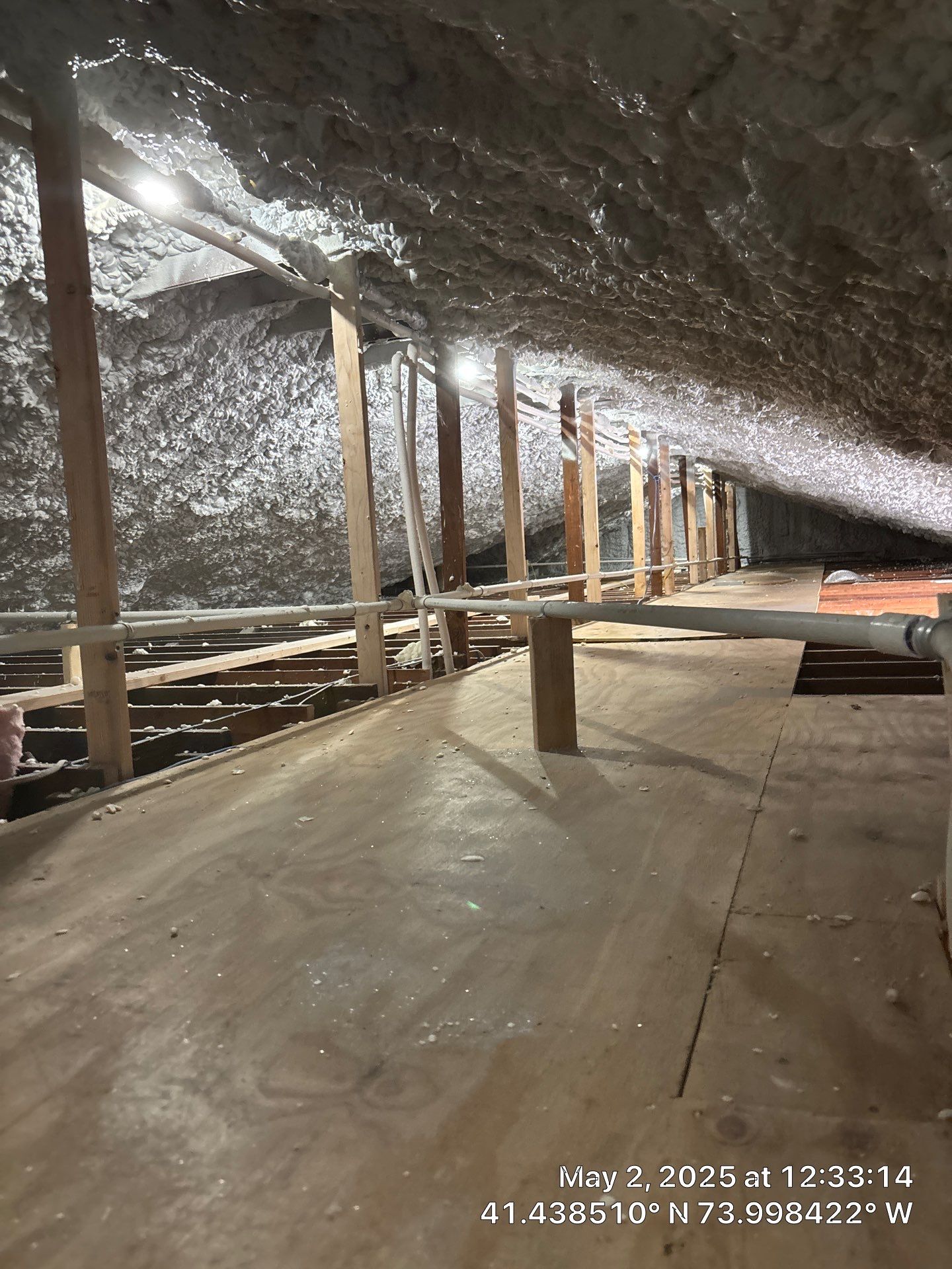 Attic Insulation using open cell spray foam by NYS Foam & Energy