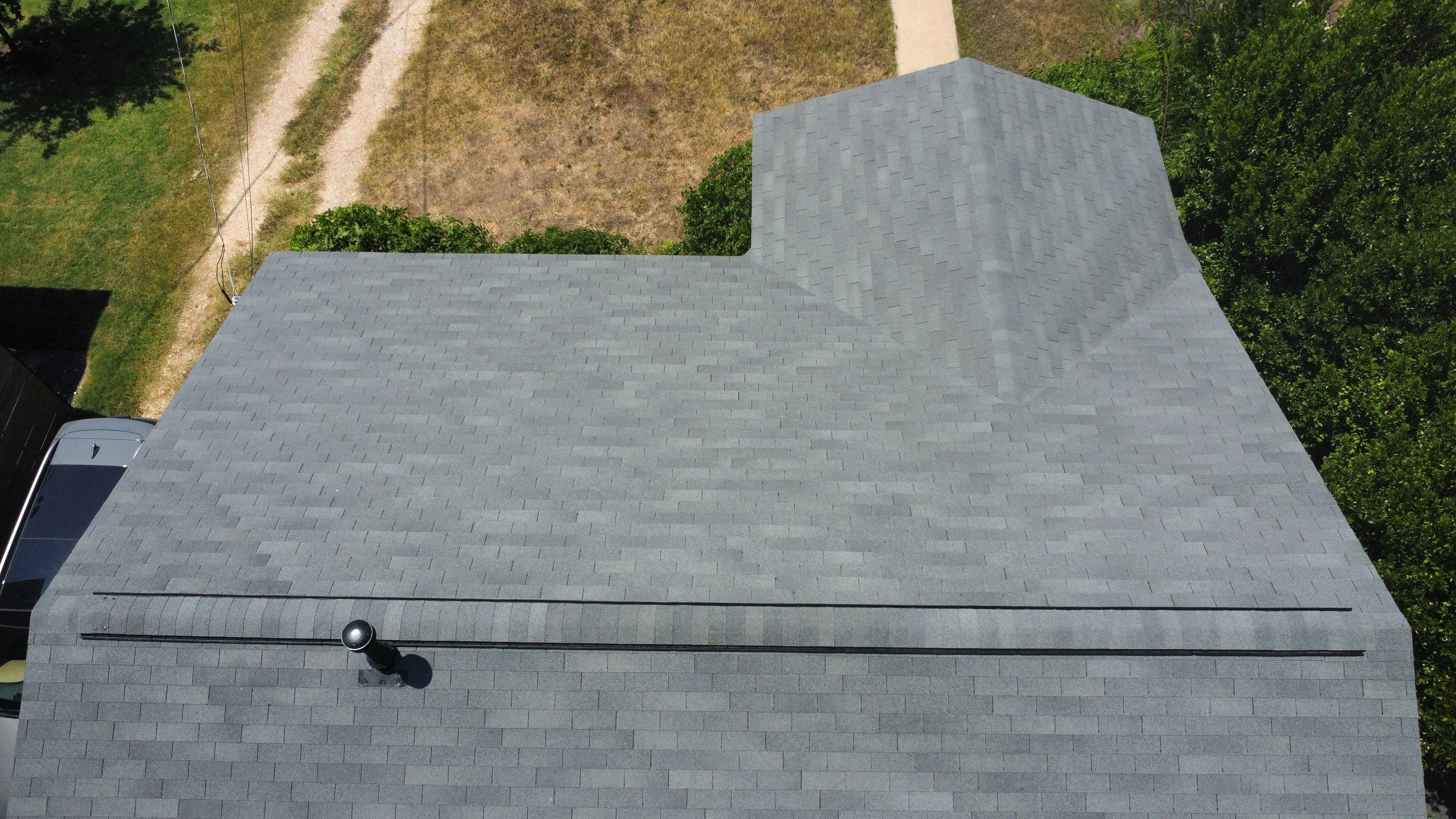 Full Roof Replacement – Main Home + Guest House | Estate Gray Shingles | Austin, TX by Kstylez Roofing & Construction